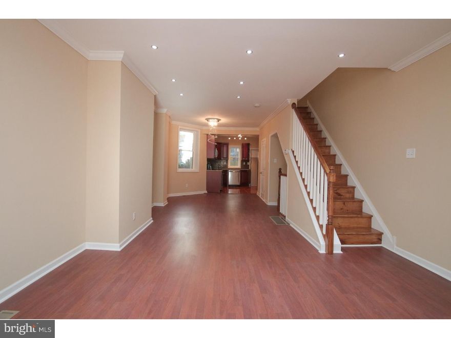 Ultimate Luxury! WOW! Look no further! Unbelievable West Philly Home Completely Knocked Out, Very close to University City and conveniently located! Do you like elegance? Well this home is one of a kind and offers every extra a buyer can want. The entire home has new windows, a new roof w/ warranty, all new siding, updated electric & plumbing, and not to mention all new efficient Heating & AC Units! The 1st floor features a huge open layout with Brazilian Cherry floors, recessed lighting, a new kitchen, which features a Granite Counter Top, Stainless Steel appliances & a large breakfast area. Also on the first floor there is a tiled powder room, which then leads to a large fenced in rear yard. The upstairs features all very huge bedrooms, and a state of the art spa bath w/ custom Italian Ceramic tile. Other key features include a completely tiled powder room and a full finished basement for your convenience. This home truly has it ALL and is a MUST SEE!