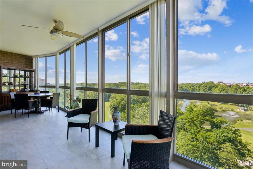 Views for miles from this rarely available penthouse-level 2 BR 2 BA plus den unit with garage parking in amenity-rich Leisure World,  a 55+ senior living community with on-site restaurants, clubhouses, health care, athletic amenities including two golf courses, pickleball, ping pong, tennis, and so much more. Perched on the top floor, this condo is one of the largest models and showcases panoramic, unobstructed views of lush greenery, walking trails, and golf courses from the stunning enclosed sunroom balcony that spans the length of the home — the perfect backdrop for relaxing afternoons or effortless entertaining in every season. 
The beautifully appointed kitchen features abundant cabinets, storage, space for a table, breakfast bar, and more. Beyond, an open and airy layout with dining area and living space and additional den in a prime spot to overlook the extensive grounds and vistas of Leisure World. The owner's suite features walk in closet plus bonus closet, soaring ceilings, and ensuite bathroom with renovated shower and second walk-in shower. Both bedrooms walk out to the fabulous enclosed sunroom balcony with horizon views. Second bathroom in hallway convenient to second bedroom and open living space. SO many upgrades inside including new LG Refrigerator (2025), renovation to primary bath and addition of second shower, new flooring throughout and new paint (2024), and newer HVAC. All of this in the heart of the best Leisure World has to offer, steps from miles of walking trails, indoor and outdoor pools, community spaces, and so much more only minutes from Silver Spring, downtown Rockville, 270/495, and Washington DC. Your Leisure World penthouse suite awaits!
