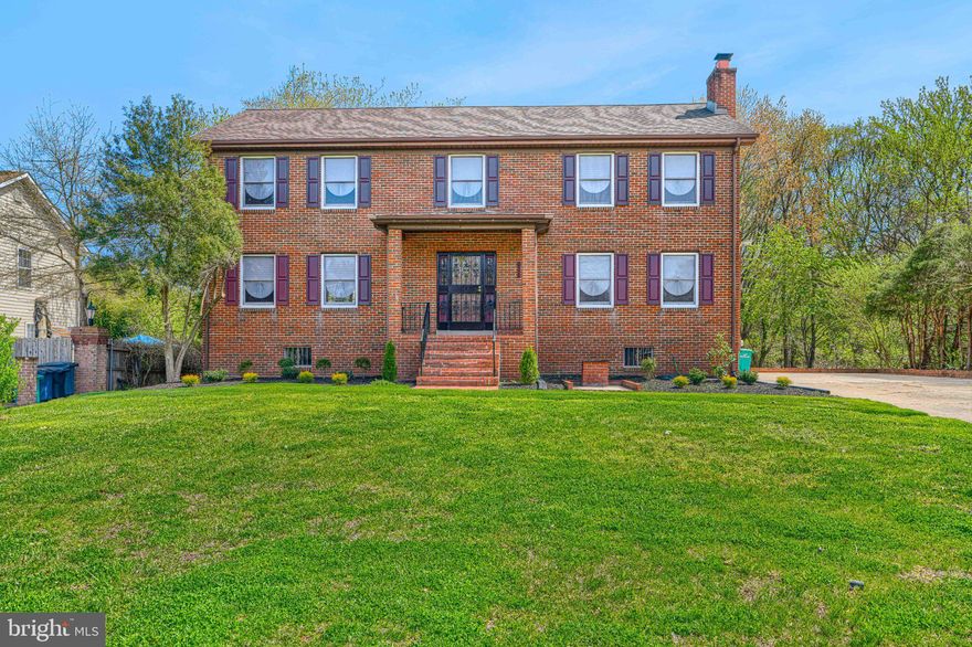 Welcome to 6510 Horseshoe Rd in Clinton, MD, just minutes away from Andrew’s Air Force Base. This all-brick and block construction home built to stand the test of time, now completely remodeled with over $100,000 in updates, blending classic craftsmanship with modern upgrades. This home makes a strong first impression with its large front yard and private driveway, while the covered front porch offers a practical space to kick off your shoes before heading inside. Step into the foyer and you’re immediately greeted by elegant imported tile flooring from Italy and a stunning curved staircase banister that adds a touch of sophistication. From here, the home opens up to a spacious and well-designed main level featuring a large formal dining room off the kitchen—perfect for gatherings—and an even larger living room, offering incredible flexibility for entertaining or everyday living. Just beyond, the cozy family room serves as the heart of the home, complete with a beautiful oversized brick fireplace that creates a warm and inviting atmosphere. The kitchen is designed to impress with tons of cabinet space, brand-new countertops, stainless steel appliances, updated fixtures, and modern lighting—fully renovated and ready for today’s lifestyle. A main-level laundry area and half bath add everyday convenience. Upstairs, you’ll find new carpet throughout and four generously sized bedrooms, including a primary suite with its own private bath. Both the primary bathroom and hall bath have been fully renovated with fresh, modern finishes—move-in ready and sparkling clean. Major updates include a brand-new HVAC system, giving you peace of mind for years to come. The basement is a wide-open blank slate, offering endless potential for a rec room, home gym, office, or additional living space. A large attic provides even more storage—something today’s buyers truly value. Out back, enjoy a flat, semi-wooded backyard with mature trees, offering privacy and space to relax or entertain, along with a convenient storage shed. If you’re searching for a solid, fully updated home with character, space, and long-term value, 6510 Horseshoe Rd delivers. Conveniently located near shopping, dining, and major commuter routes—this is one you don’t want to miss.