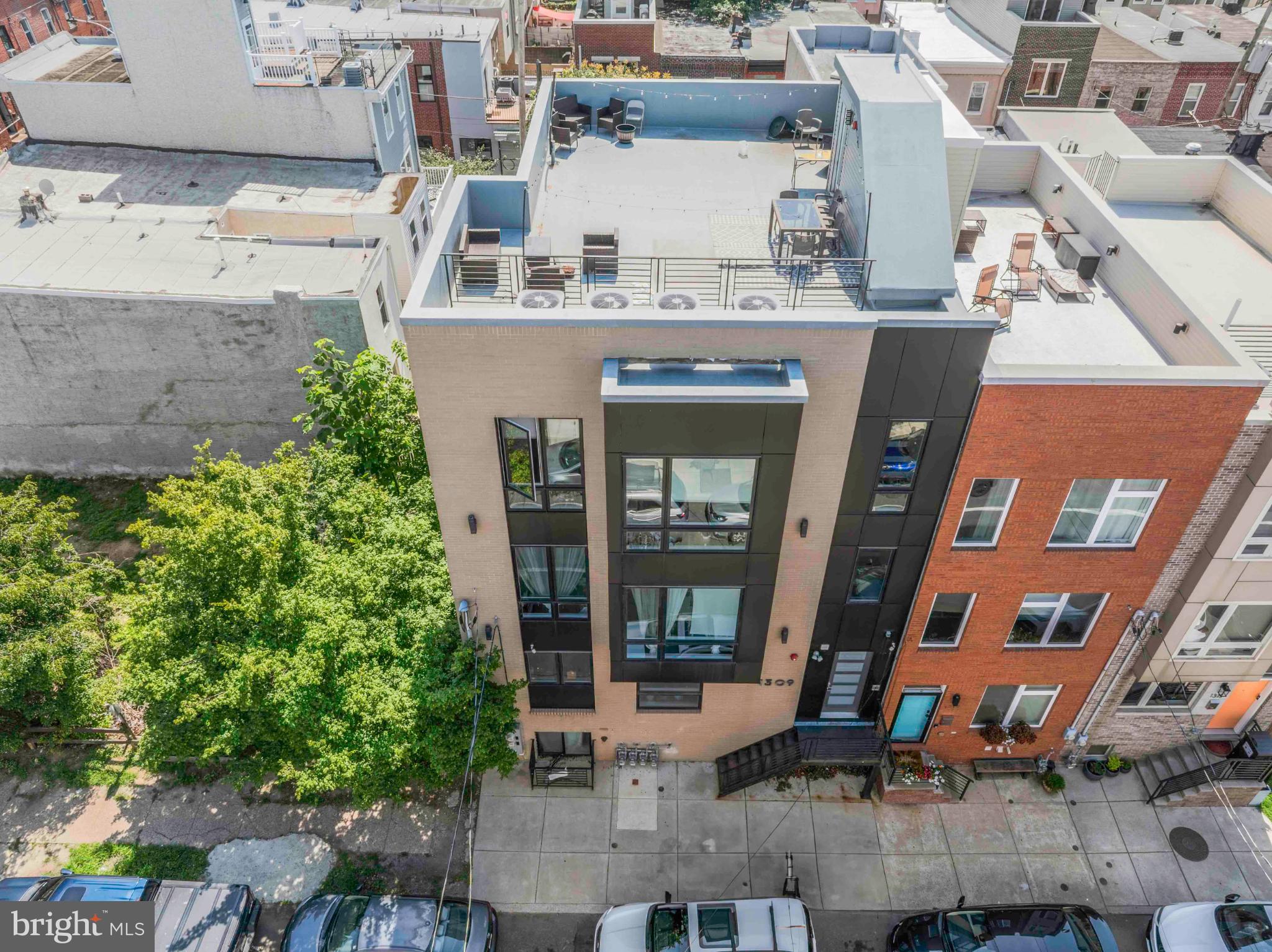 1309 South Twentieth Street is a turnkey, newly built 6.52% CAP quadplex for sale in Point Breeze, Philadelphia — a Top-10 USA MSA. This prime multifamily real estate is now available as a cash-flowing rental investment property, located in one of Philly's most "in-demand" submarkets for residential housing. 1309 S 20th is a 4,765 SF boutique apartment building with spacious 2-3bd units (two 2x2, two 3x2) averaging over 1,000 SF per residence — with a panoramic rooftop terrace showcasing sweeping skyline views. Apartment features include: Sun-drenched interiors, oversized windows, washer/dryer in-unit, contemporary kitchens and baths, LVP flooring, high ceilings and modern colorways. Easy access to all amenities, parks, roadways, transit options, shops, cafes, bars and restaurants in Philadelphia. Approx. 5.5 years remaining on full 10 year tax abatement. Minimal OPEX. Enquire within for financials.