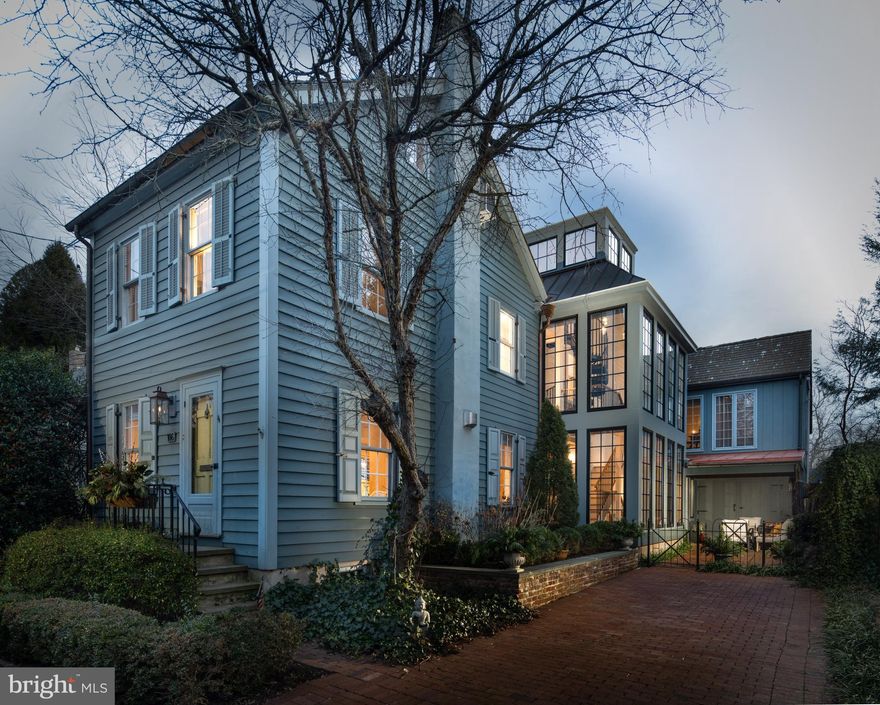 HISTORIC CHARM MEETS MODERN DESIGN! Say hello to 106 Penn St located in historic Newtown Borough Pennsylvania! This residence, which was originally a barn (circa 1778) and converted into a dwelling in 1853, has been completely modernized with the flow and function of a historic structure. In 1978, the home had undergone a complete rebuild that included stripping to its joists and restoring it from the foundation up. FUN FACT…A notice of the election of Franklin Pierce from 1853 was found in the walls during demolition. This most recent updating took place in 2019 – 2020 by the current owners. This included complete renovation of the first and second floors with approval from the Newtown Borough Historic Architectural Review Board. All work was done by local artisans and builders. Highlights of this most recent renovation included connecting the main home with the carriage house and adding full bath, laundry room and new staircase to this space. A stair tower was designed and built connecting all three floors of the home.  A key aspect of this addition was to bring in an abundance of natural light and create a dramatic and beautiful element to the home. Another addition included the dining room, expansion of the main bedroom suite to include vaulted ceiling, installing all new bathrooms (3.5 in total), added a slate patio to the back of the home and a front patio/courtyard to the front of the home. One of the main goals of the project was to open-up the first floor plan and create “gathering style” kitchen with an open living area. This goal has been achieved!! The kitchen features custom designed cabinetry and wood work including crafted Water Street pulls & knobs, Calcutta Gold marble countertops sealed with granite shield with warranty, integrated Sub-Zero refrigerator, La Cornu CornuFe 110 Range, custom wood beams, Shaw farmhouse sink with crafted Waterstone Living faucet & accessories, and capped off with gorgeous French Oak flooring. This all opens to a wonderful great room complete w/ a Valor high end gas fireplace with custom gypsum plaster surround created by local artisans at Bucks County Art of Plaster, and French oak flooring. The second level is home to the main bedroom suite that has been expanded and includes a raised ceiling with shiplap wood, automatic remote window shades, French oak floors, Zen style main bathroom w/ Toto Washlet heated commode & bidet, Quartz concrete sink, Victoria and Albert Limestone composite soaking tub and pebble heated radiant floors. A 2nd BR is located on this floor as well with En suite bath. The stair tower (which includes all automatic window shades & Hanglin liquid pendants) continues to the third level where a 3rd BR is located w/ half bath. Back on the main level is the interior connection to the carriage house. There is a new side entry door that was added and a laundry/mud room acts as the passage to the renovated carriage house. The carriage home has a functional first floor that is currently used as a TV/home office area and upstairs is light drenched with vaulted ceilings, wet bar and access to an outside deck that connects to the main bedroom too. This second floor of the carriage house is ideal for a 4th bedroom or enjoy it as an additional entertainment area. The exterior has been preserved and offers a front courtyard with covered seating area, 3 Campania Echo fountains with lighting, brick patio base & TV inside barn doors for outdoor viewing. The rear yard/patio is very private and features a blue stone patio, custom brick wall, beautiful specimen trees and 2022 Hotsprings hot tub Limelight collection, w/ fresh saltwater system. A few other items to mention include sound system on main flr, main BR suite and carriage house, Emtek hardware t/o the home and Aria vents & returns. Architect Joel Petty designed this dream home for the current owners and Nancy Gracia of BareRoot Design Studio, provided her exceptional talent & eye to bring the new space to life.