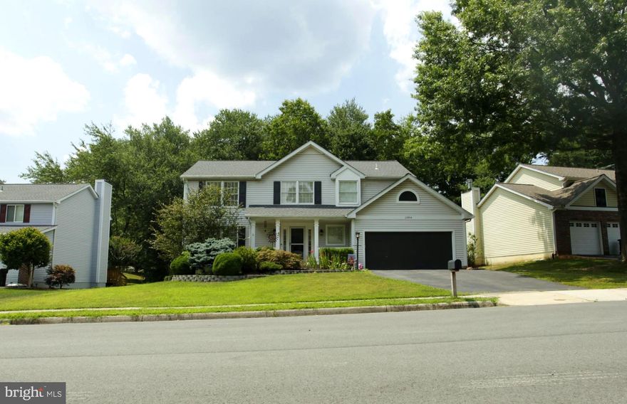 Fabulous 3 Finished Level 3500 Sq Ft Front Porch Home in Sought-After Old Bridge Estates with a BEAUTIFUL Fenced Backyard Adjacent to Treed Parkland!