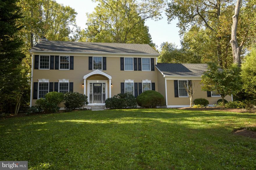 Stunning 4BR colonial, nestled in a quiet cul-de-sac in Jamestown on the Magothy. Updated and meticulously cared for, this house has it all - sunroom, built in office, recessed lighting, in-wall speakers, hardwood floors, basement rec room, security system & 2 car garage. Private lot beautifully landscaped, backs to wooded area. New roof and siding (2010). Broadneck schools and water privileged!