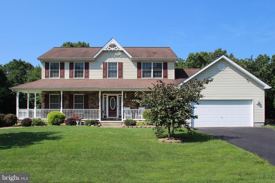 MOVE IN READY*HURRY TO SEE THIS IMMACULATE PORCH FRONT COLONIAL LOCATED ON A PRIVATE .73 ACRE LOT BACKING TO TREES*FEATURING 4 BEDROOMS, 3 FULL BATHS, SUNROOM ADDITION, 2 CAR GARAGE & FULLY FINISHED LOWER LEVEL*MAIN LEVEL BR, LGE LIVING RM W/ FP & REMODELED KITCHEN W/ GRANITE COUNTERS*UPPER LEVEL LAUNDRY & EXTRA LGE MASTER SUITE W/ GARDEN BATH*AMAZING LOWER LEVEL W/ WETBAR & WALKOUT TO YARD*