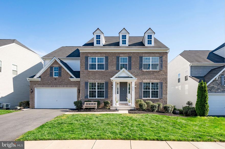 Exquisite Elegance Meets Modern Comfort in This Stunning Home!  Step into a world of sophistication and luxury with this exceptional 7-bedroom, 6.5-bath residence, perfectly situated on a beautifully landscaped 6,621 square foot lot that backs to common-area trees. This masterpiece boasts high-end finishes, designer details, and impeccable craftsmanship! The grand foyer welcomes you with soaring ceilings and elegant architectural details, with a living room or home office on one side and a large formal dining room on the other with a beautiful chandelier, recessed lighting and wainscotting accents, both behind elegant sliding glass doors. The formal dining room connects to the gourmet kitchen through a butler’s pantry area with a walk-in pantry, cabinets, quartz counters, and an extra sink. The foyer pulls you into the combined gleaming white gourmet kitchen, sunlit breakfast area, and huge family room. The gourmet kitchen is a culinary enthusiast’s dream, complete with a massive quartz-topped island, abundant cabinetry, stainless steel appliances, a pantry, and a butler’s pantry.  There is a built-in microwave, double ovens, a cooktop with hood, white cabinets, some of which have glass doors, and plenty of seating for guests. The sunlit breakfast area is large enough for the whole family to sit down to informal meals. It connects to a huge trex deck with lighted railings and plenty of space for grilling and outdoor entertaining. A stairway from the deck leads to the lower level and the outdoor swim spa hot tub that is equipped with jets to allow swimming against the current, and is large enough for the whole family to enjoy.  (12' Endless Pools R200,)  There is also a covered patio next to the hot tub with fans and lighting. The family great room has a cozy gas fireplace and southern-facing windows that flood the space with natural light. Enjoy a seamless flow between indoor and outdoor living, with access to an expansive deck. The rest of the first level includes a main-level bedroom suite, with en-suite bath and a large closet. It is perfect for aging parents or guests. The huge mudroom off the two-car garage comes with a second stainless double-door refrigerator that conveys, plenty of space to hang coats, a large double-doored closet, and a half-bath.  Also on this level is an semi-open office space with plenty of counter space and hook ups. There are four bedrooms on the second floor, including a lavish primary suite sanctuary, featuring a large walk-in closet and a spa-like en-suite bath with a dual vanity with extra cabinet space and a step-in shower more than big enough for two people. An accent wall and tray ceilings with recessed lights give the suite a very modern look. Three more spacious bedrooms grace the second floor, two of them linked with a jack-and-jill bathroom, and the third with its own en-suite bath and walk-in closet. In addition, a massive loft-style recreation area serves as the perfect lounge or playroom.  There is also a large laundry room with plenty of cabinet space. The fully finished walkout lower level is its own 1,665 square foot apartment, with multiple potential uses.  It could be an amazing in-law suite or rentable walk-out basement.  It boasts two large bedrooms, each with walk-in closets and connected full baths, a huge living area, and a full gourmet kitchen with an island that could serve a large home on its own. A second washer and dryer are conveniently included in a large storage and utility room with plenty of shelves.  The under-the-stairs closet serves as a second pantry. Additional features include a two-car garage with ceiling racks for extra storage, abundant storage, and an unbeatable location. Conveniently near major commuter routes such as Roberts Pkwy, Fairfax County Pkwy, Rt. 123, Braddock Rd, Guinea Rd, and I-495, this home offers both luxury and convenience. It is only minutes from the Burke VRE station.