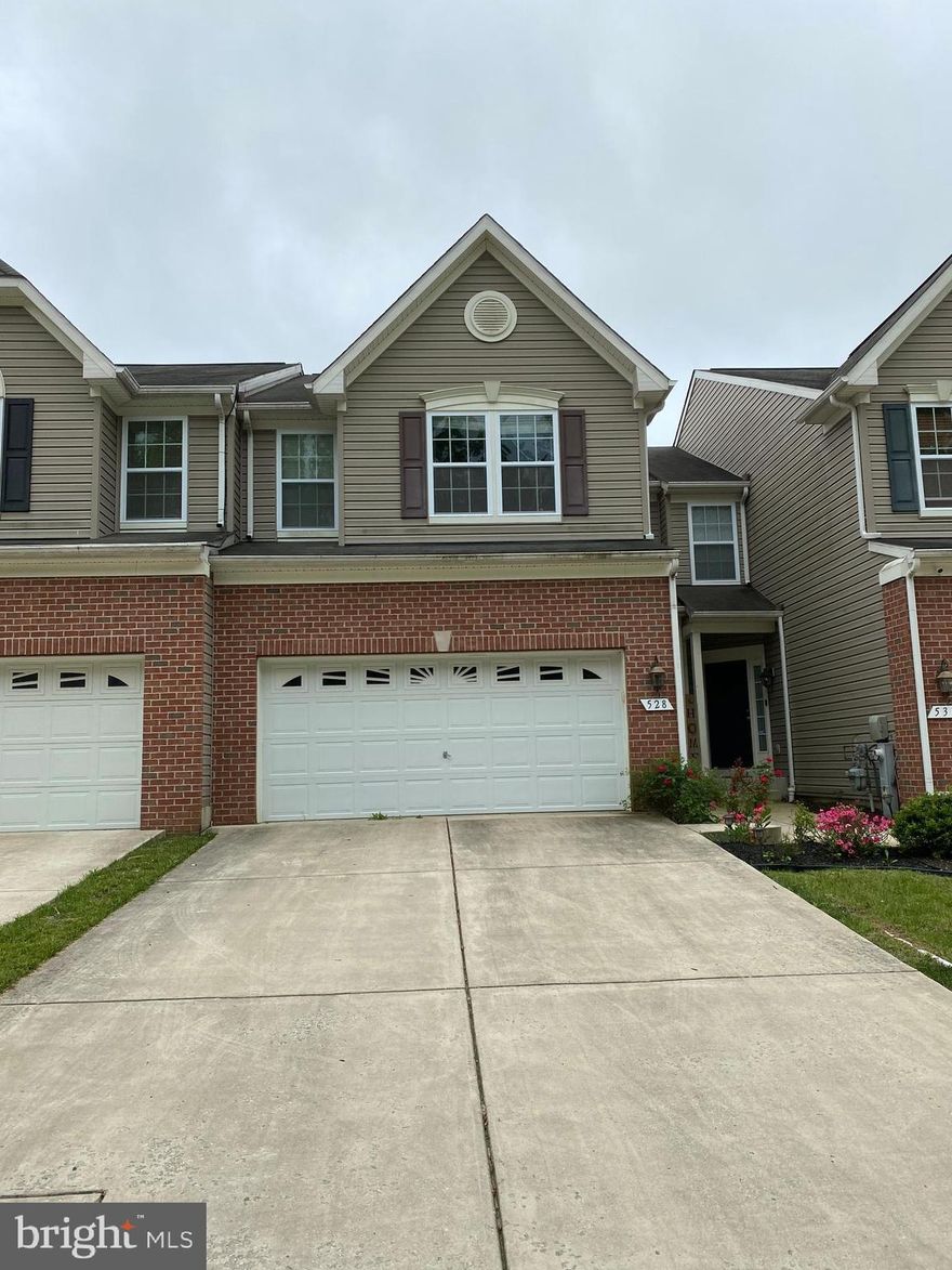 Rent this beautiful 4 bedroom and 3 1/2  bath villa style home.  Home has many upgrades, stainless steel appliances, first floor wood flooring, fireplace, deck, basement exit door and 2 car garage.  Community pool and Clubhouse. $40.00 application fee per adult.