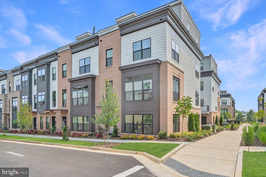 New lower price!  Tysons Ridge is  ideally located near all the vibrant Tysons retail, dining, and entertainment with easy access to commuter routes and the Metro. This is one of the final homes of the 104 modern townhomes with thoughtfully designed onsite amenities including a pergola with seating and fire pit, walking trail, fitness area, children’s playground and more. This Evanston townhome on lot 73 is an end home and  has lots of upgrades included - including an elevator, 4 bedrooms,  4.5 Baths, Standard loft level with rooftop terrace, open main level floorplan,  chef’s kitchen with large island, contemporary finishes and  multi-gen suite for family and friends.  Move in Now!   $25,000 towards closing cost assistance too!  This is one of the best locations in the community overlooking a courtyard!