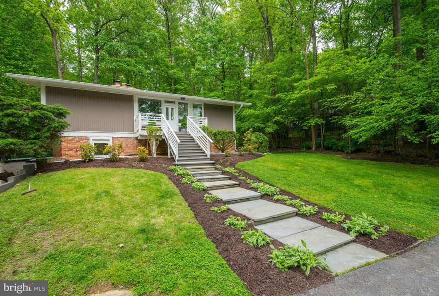 New price! Make an offer! Fabulous contemporary home nestled on a wooded lot with a gazebo and pool to complete a zen atmosphere! Open floor plan with brick wall/fireplace separating living room and dining room/. New interior and exterior paint. New quartz countertops and appliances. Updated BA's includes new flooring, vanities and fixtures.