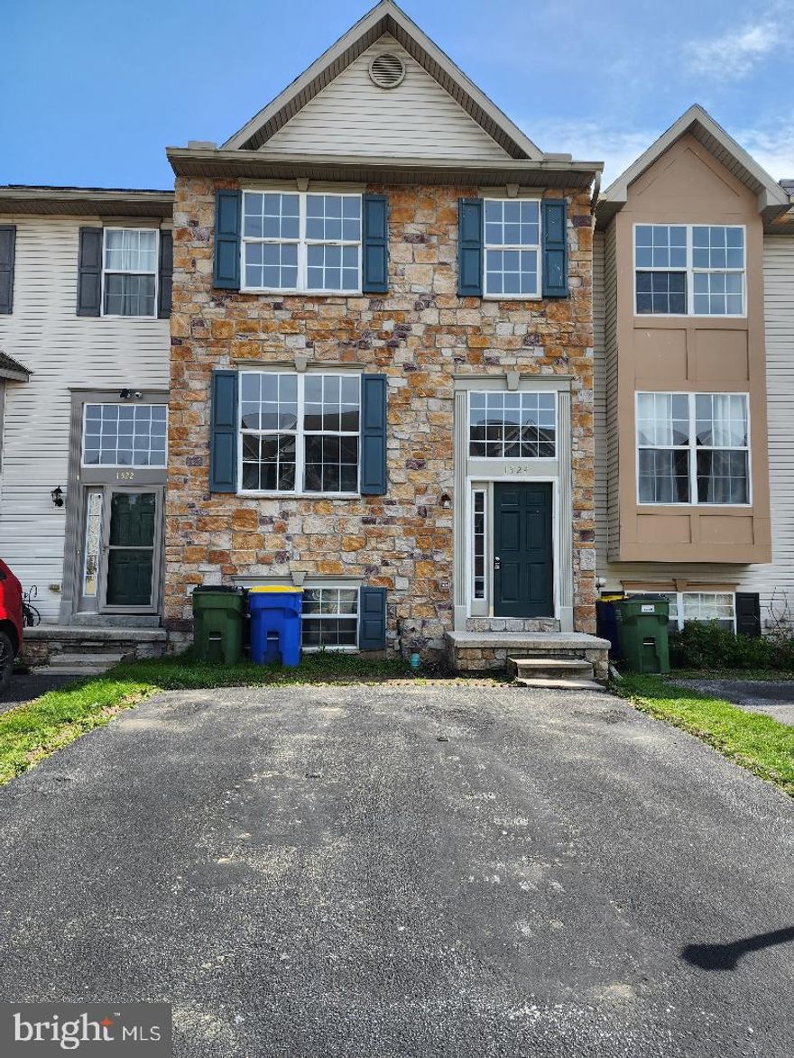 Townhouse comes with kitchen island and corner pantry, dining room off kitchen, walk-out unfinished basement, patio, all three bedrooms are located on the second floor (the larger of the three bedrooms has its own bath and walk-in closet).   New paint and flooring.  Property Sold As Is.