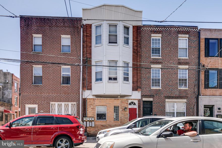 Available May 15th: Fantastic bi-level first floor 2 bedroom/ 2 bathroom apartment with private patio and two new bathrooms. The unit features hardwood floors, a modern fully equipped kitchen, w/ dishwasher, range/oven and refrigerator. On the first level is the living/dining room combo, new full bath with walk in shower, bedroom and private rear patio. The lower level has the second bedroom and new bath with subway tile, private laundry area and a separate entrance. Additional features include gas hot air heat and central air, bedrooms that each offer ample closet space and individual bathrooms. Tenant pays gas, electric, and $60 per month due w/ rent which covers water and trash. Close by are neighborhood eateries/bars . Short distance to to center city, the Italian Market, Passyunk Square and Septa. Schedule a tour today!