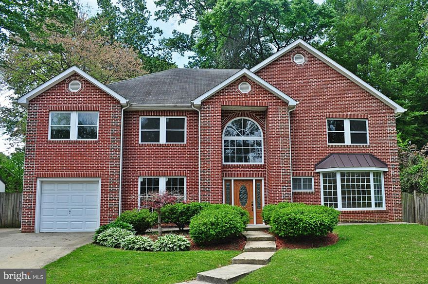 Open House Sunday 5/31, 1-4pm. Spectacular Colonial. Walk to VRE. Space for everything - large family gatherings to formal entertaining.  Shows like a model home - new hardwood floors, carpet & paint. Foyer with 2nd story overlook. Huge master suite w/luxury bath. Gourmet kitchen w/granite counters & upgraded appliances. Family room with marble fpl. (gas). Fenced yard. 1-car garage.