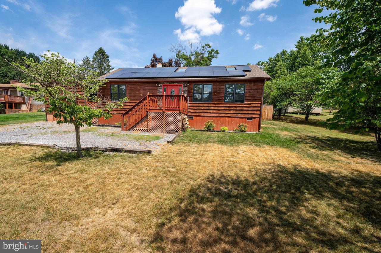 Check out this beautiful 2015 Cedar Cabin in Egypt Bend Estates, which hosts a gorgeous community access point to the Shenandoah River! With its cozy "cabin in the woods" exterior and modern interior look, it's perfect for everyone and more importantly, move in ready! This home has all the modern upgrades you'll love: granite counters, wood cabinets, large sink, stainless steel appliances, and hardwood flooring throughout . There's a great detached one-car garage that offers comfort, extra parking and extra storage space as well. Sit outside on the front deck or back patio and enjoy your coffee every morning in this amazing cabin located only 2 minutes from the Shenandoah River, and only 10 minutes to historic downtown Luray, Skyline Drive and the Luray Caverns!