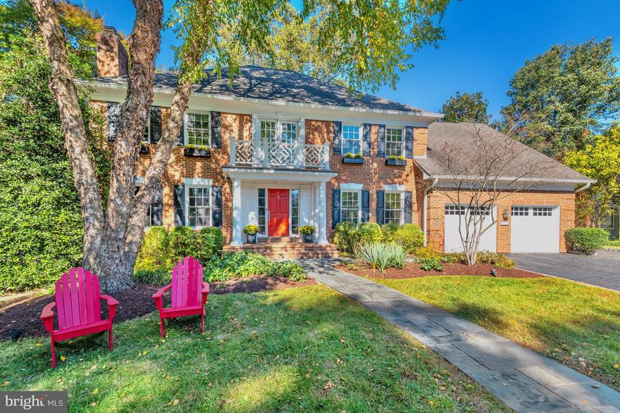 Located on one of the most desirable streets in sought-after Chesterbrook Woods, this move-in ready brick colonial is sited on a beautifully landscaped flat lot with mature plantings, enchanting gardens, and lush green space.  With 4 Bedrooms and 4.5 Bathrooms this residence offers over 4,800 square feet of thoughtfully designed living space across three beautifully finished levels. A 2-car garage provides direct entry to the main level, while an expansive lower level enhances convenience and functionality.

Step into the open 2-story foyer, where gleaming hardwood floors, elegant crown molding, and stylish wainscoting set the stage for timeless sophistication and comfort. The Living Room features an elegant wood burning Fireplace with granite surround, while the Dining Room is illuminated by a large bow window with picturesque views of the lush backyard, perfect for everyday gatherings or formal entertaining. A private Office with double doors provides a dedicated and quiet work-from-home space.

The recently updated Kitchen features refinished white cabinetry with undercabinet lighting, a stylish backsplash, new flooring, KitchenAid, GE, and Bosch appliances, and a center island with sleek quartz counters.  The adjacent sunlit Breakfast Room offers direct access to the rear deck and yard, seamlessly blending indoor and outdoor living. The Family Room impresses with a vaulted ceiling, three sets of sliding glass doors to the deck, built-in shelving, in-ceiling speakers, and a floor-to-ceiling stone Rumford style Fireplace. A Powder Room with marble tile floor and a Laundry Room with custom cabinetry, large sink basin, and large front loading washer and dryer complete the main level.

Retreat upstairs to the private Owner’s Suite, where a large walk-in closet and a recently updated spa-like Bathroom await. Enjoy a soaking tub, frameless glass shower with seating, double vanity, separate water closet, and designer lighting. The upper level also features an additional Bedroom Suite with an updated ensuite Bathroom, plus two additional Bedrooms connected by a refreshed Jack-and-Jill Bathroom.

The Lower Level is thoughtfully designed for relaxing, working out, or enjoying a fun gathering.  The large Rec Room offers built-in speakers, a Regency Gas Fireplace, and custom shelving. Additional highlights include a separate flex space with French doors, an exercise studio with mirrored walls and built-in speakers and a bonus room. A full Bathroom and an abundance of storage space complete this level.

The outdoor living area is exceptional for entertaining, playing, or relaxing, whether on the expansive low rise multi-level deck, in the beautifully landscaped yard, or among the stone walkways and gardens.
With its blend of timeless architecture, spacious interiors, and picturesque surroundings, this home  offers a wonderful place to call home. Close to the Chain Bridge, Chesterbrook Shopping Center, Arlington, Downtown McLean, and Tysons. Enjoy nearby hiking trails, parks, or a stroll through the neighborhood. Close proximity to Reagan and Dulles airports.  Top rated Chesterbrook ES, Longfellow MS, McLean HS pyramid.