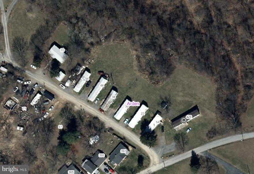 MOBILE HOME PARK! FANTASTIC INVESTMENT OPPORTUNITY! 7 mobile homes in total. 6 units are owned and one is lot rent. All with solid rental history on 5 acres. All units are separately metered and the tenant pays utilities.