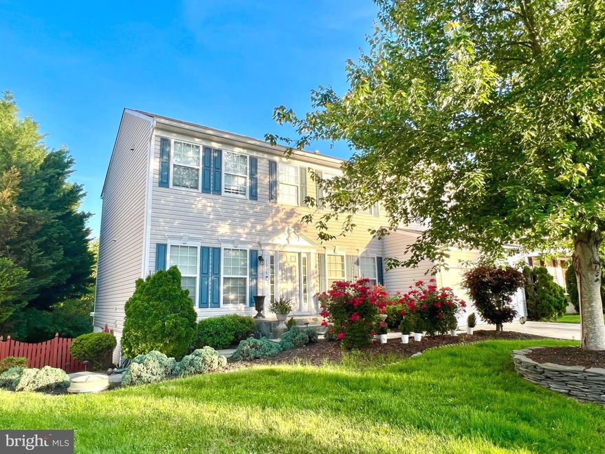 This is the one you have been waiting for!  WOW is an understatement with this beautifully updated home ready for new owners.  7 bedrooms and one bedroom not to code in the basement, 4 full baths and a fully finished basement with kitchenette.  Georgous New Hampshire floor plan well maintained and full of improvements!  Home features tall ceilings, open concept kitchen, and family room with tons of natural light pouring in from every angle.  The grand two story family room features a stone accent running floor to ceiling with a gas fireplace.  As you enter the home you will be impressed by the dining room and living room that could also serve as an office.  A main level bedroom and full bath are perfect for guests or multigenerational purposes.  Upstairs there is the primary suite with updated bathroom, three spacious bedrooms, and an additional full bath off of the main hallway.  The fully finished basement is sure to impress with access to the back yard and additional laundry room, just like having a mini apartment downstairs!  The deck and flagstone patio will be great for entertaining.  This lot is very private as it backs to trees and fully fenced.  The community has been re-districted to the new Potomac Shores Middle School.  You will also have access to the community pool, a clubhouse, walking trails, and playground/tot lot.   Best of all, this home is located near everything imaginable- easy access to I-95, restaurants, shopping, Potomac Mills, Stone Bridge, the new Rose Casino, commuter lots and VRE station.  Just minutes from Quantico Base!  Schedule your showing today before this beauty is sold!  Check out the virtual tour!