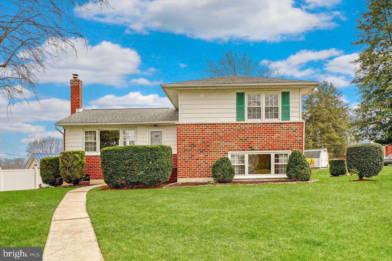 Beautifully renovated split-level house in a very high in demand Campus Hill neighborhood. Updated kitchen is bright and efficient with SS appliances and quartz countertop. The house boasts lots of natural light and plenty of windows. Recently added Full bathroom ( w/ permit) in primary bedroom. New HVAC. The lower level has oversized family room, dining area and half bath. This space can be used as home office. There is a large driveway and large patio in the back for summer party. Partially fenced backyard. Roof replaced in 2014. Finished basement has large picture window and is bright. This can be used as play area or home office office. Close to 695, restaurants and shop. To see, it is to love it!