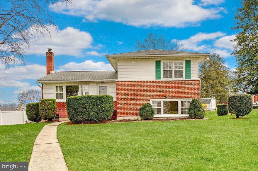 Beautifully renovated split-level house in a very high in demand Campus Hill neighborhood. Updated kitchen is bright and efficient with SS appliances and quartz countertop. The house boasts lots of natural light and plenty of windows.  Recently added Full bathroom ( w/ permit) in primary bedroom. New HVAC. The lower level has oversized family room, dining area and half bath. This space can be used as home office. There is a large driveway and large patio in the back for summer party. Partially fenced backyard. Roof replaced in 2014. Finished basement has large picture window and is bright. This can be used as play area or home office office. Close to 695, restaurants and shop. To see, it is to love it!