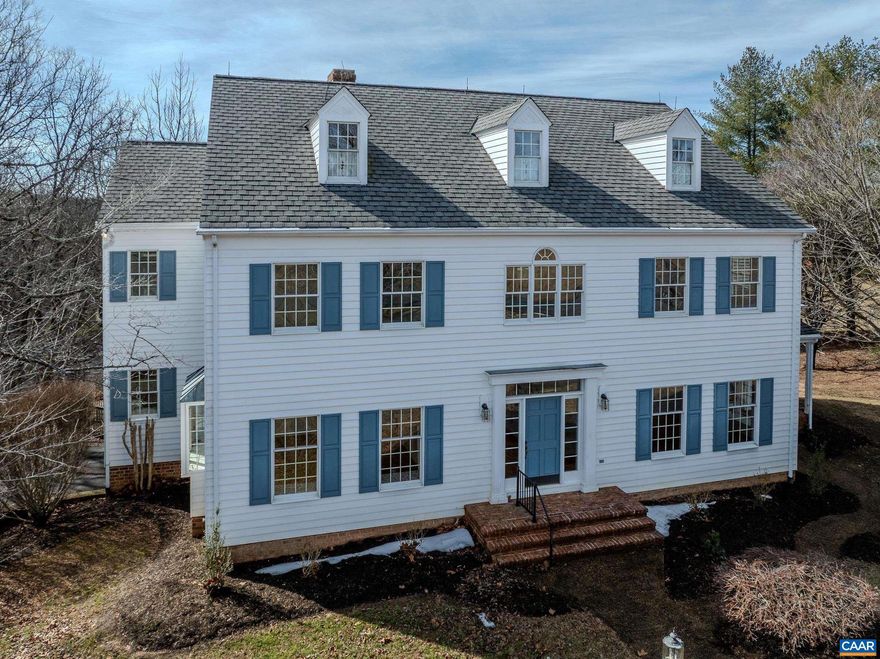 Stately Colonial in Inglecress offering 4 bedrooms, 3.5 baths and over 4,400 finished square feet plus outstanding expansion potential. Set on a picturesque 4.5+ acre lot with circular drive and mountain views, this home features generously sized rooms, hardwood floors throughout the main level, and classic architectural details. Formal living and dining rooms with custom built-ins lead to a dramatic sun room with vaulted ceiling, exposed beams and brick fireplace. The spacious kitchen includes a large island, abundant cabinetry and a sun-filled breakfast area opening to an expansive rear deck that is ideal for entertaining.The main-level primary suite provides convenient one-level living with a large bath and two walk-in closets. Upstairs bedrooms are oversized with shared and private bathrooms and a flexible space for office or guests. An unfinished walk-out basement, and walk-up attic offer significant opportunities for additional living space, recreation or guest suites. An existing in-ground pool footprint presents the chance to restore or reimagine a private backyard retreat. Located just 3 miles to Charlottesville shopping and dining, this Inglecress home offers space, location and value in Albemarle County.,Oak Cabinets,Fireplace in Living Room,Fireplace in Sun Room