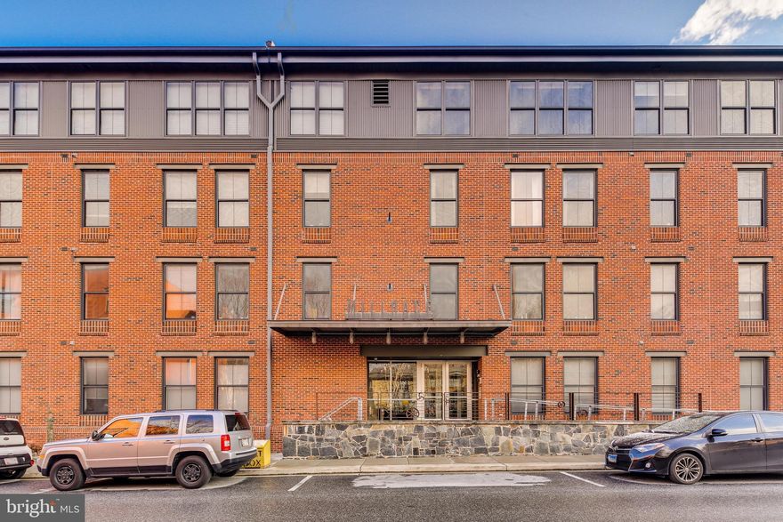 Rare opportunity to rent a top floor end-unit in Clipper Mill's Millrace building.  Historic building with modern amenities including open floor plan with high ceilings, tall windows, granite counters, and stainless steel appliances.  New wood flooring and HVAC replaced in 2019. Lots of natural light. Enjoy the community sitting room, covered parking, outdoor sitting areas, and pool that will make your apartment the spot to visit during summer. Close proximity to coffee shops, gym, light rail, restaurants or walk across the street to Woodberry Kitchen.  Shows well.