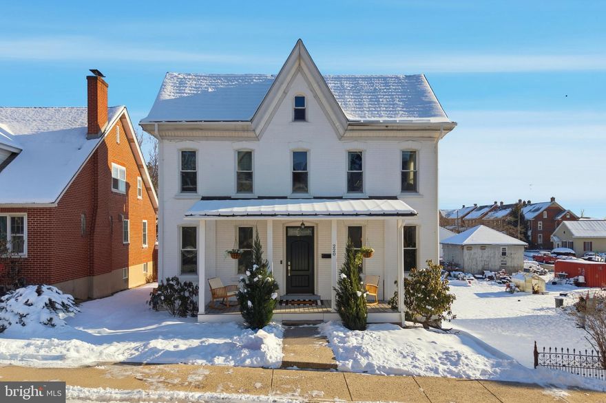 It’ll be LOVE at first sight when you walk into 220 3rd St in East Greenville…this wonderfully maintained brick Victorian / Colonial home welcomes you with a beautiful front porch with composite decking and a metal porch roof. As you enter into the spacious living room you are greeted by 9’ ceilings and beautifully restored stairs and an entire main level that is finished with dark bamboo flooring. The family room features a shiplap accent wall and has easy access to your mudroom and full bath with glass stall shower both with ceramic tile floors. The stunner is the amazing kitchen and dining room in this home. Your kitchen features a center island with sink built-in, gas cooking, stainless steel appliances, a cleft split slate tile backsplash and gorgeous white cabinetry with soft close drawers and brushed gold door hardware. And if you enjoy entertaining, the kitchen opens into the dining room with gorgeous antique style light fixture and quartz topped built-in buffet with wine / beverage refrigerator and added storage for your family! Heading upstairs you’ll find three spacious bedrooms all with ceiling fans and W2W carpeting. Your primary bedroom has the bonus of an upstairs porch to sit outside and enjoy the sunrise and morning coffee in the peace overlooking your backyard! Your upstairs full bath features ceramic tile floors, a beautiful tiled tub shower and beautiful brushed gold hardware and light fixtures! You even have walkup stairs to your attic that has the potential to be converted into a finished space for your family! The walkout basement has plenty of space for storage and has your laundry area as well, this is the perfect place for a workshop, workout area or just additional storage space! Enjoy your amazing back deck plus a beautiful backyard! You gain a 2 car carport with wood siding that gives it a modern upscale look you’ll love plus a 3rd parking spot next to the carport. Your next home features dual zoned high efficiency heating (natural gas) and central air plus all energy star windows too! Get ready to fall in love with your next home in East Greenville, this home is turnkey and waiting for you to make it yours! Showings begin at the open house on Thursday 1/22/26 at 4pm!