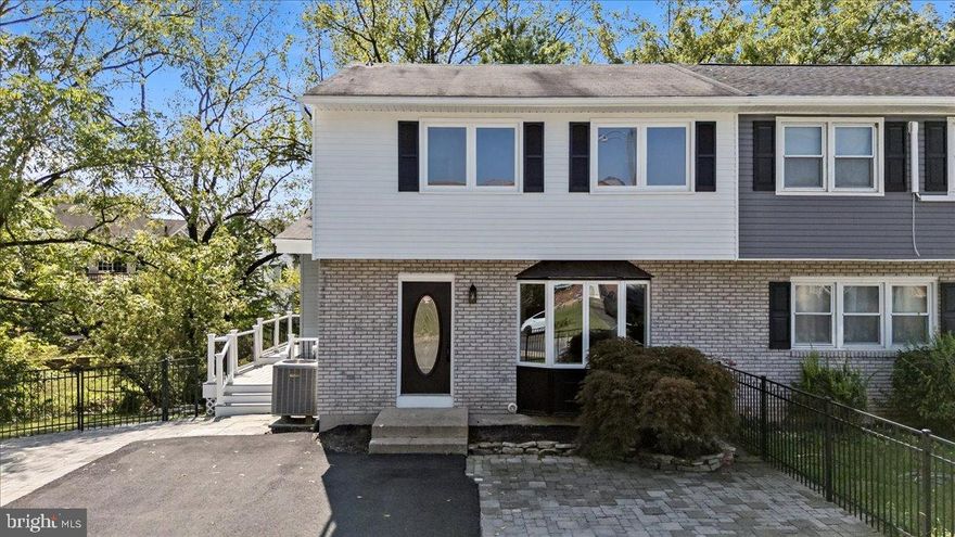 PRICE IMPROVED AND COMES WITH 1 YEAR HOME WARRANTY!  Welcome to 624 E 8th Street in Northampton Borough, offering 4 bedrooms, 3 full bathrooms, and over 2,300 sq. ft. of finished living space across three levels. This home blends comfort and functionality with a layout designed for everyday living and entertaining. The main level features a bright living room with bay window, a dining area flowing into the kitchen with pantry storage, and an expansive family room ideal for gatherings. A first-floor bedroom, full bath, and laundry room provide flexibility and convenience with the potential for an in-law arrangement. Upstairs, the private primary bedroom is complemented by two additional bedrooms and an oversized full bath with ample space for storage or future customization. The finished lower level includes a recreation room with laminate flooring and a full bath, offering options for a home office, fitness space, or guest suite. An oversized two-car garage with additional storage completes the lower level, with room for a workshop or hobby space. Enjoy the versatility of multiple living areas, abundant natural light, and a layout offering room to grow. Conveniently located in Northampton Borough with access to local shopping, dining, parks, and major routes, this home provides space and flexibility for today’s lifestyle.