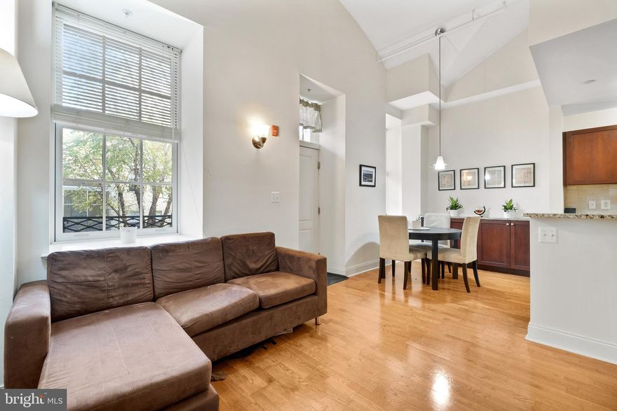 Incredible Opportunity at Naval Square: Fantastic 1 bed/1 bath located within historic Biddle Hall in available for move in on June 1st! Park in your assigned PARKING SPACE or walk only steps over the South St Bridge to UPenn, CHOP & HUP. Prime location for graduate students, faculty and hospital residents! This spectacular home features a private veranda entrance overlooking the lush green courtyard that draws many to this suburban setting just blocks from Fitler & Rittenhouse Square. Significant upgrades include cherry cabinets and granite counters, hardwood flooring throughout, pendant lighting, GE stainless appliances, washer/dryer, and tile & upgrades in the bathroom. Ample storage, including built-in TV cabinet in living room, built-ins in bathroom, built-in dining credenza, coat closet and extra large pantry in kitchen. Separate storage locker included. All this with extraordinary Naval Square amenities: concierge, state-of-the-art fitness center, seasonal pool, dramatic community room w/40' domed ceiling (also available for private functions), 24-hour secure, gated community. Very close proximity to South Street Bridge, UPenn, CHOP, HUP & Drexel. Exciting restaurants, shops, cafes, located just outside the gates in the Graduate Hospital Area, Fitler & Rittenhouse Sq s. Only steps out the back gate you can enjoy the Schuylkill River Park, including the Award Winning Trail & Boardwalk.  NO PETS PLEASE. FIRST MONTH, LAST MONTH & SECURITY DEPOSIT DUE AT SIGNING. $400 MOVE IN / OUT FEE DUE 10 DAYS PRIOR TO MOVE IN.