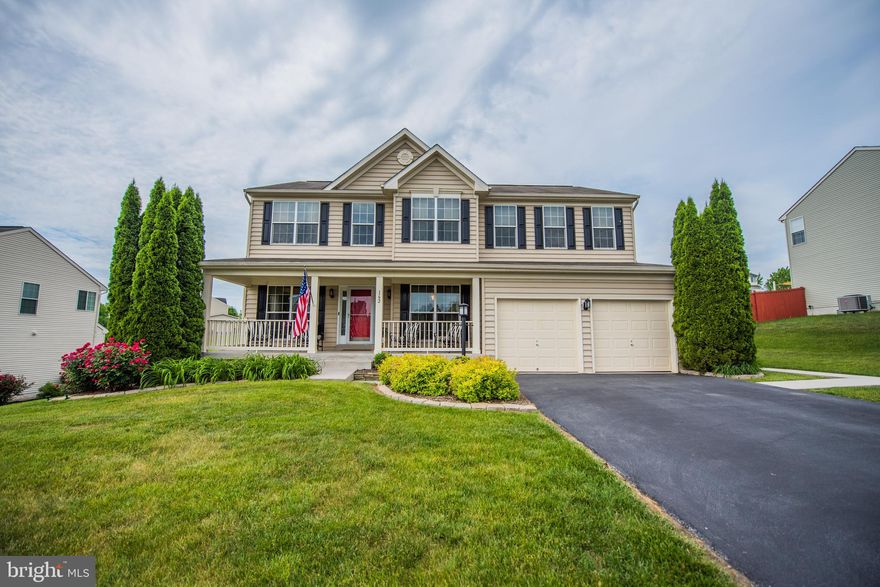 This 2 story colonial with full finished basement also offers, 2 car garage, fenced rear yard, front porch, patio and pergola, 4BR 3 1/2 baths, upgraded flooring, great kitchen, stone fireplace, zoned heating and a/c and so much more!