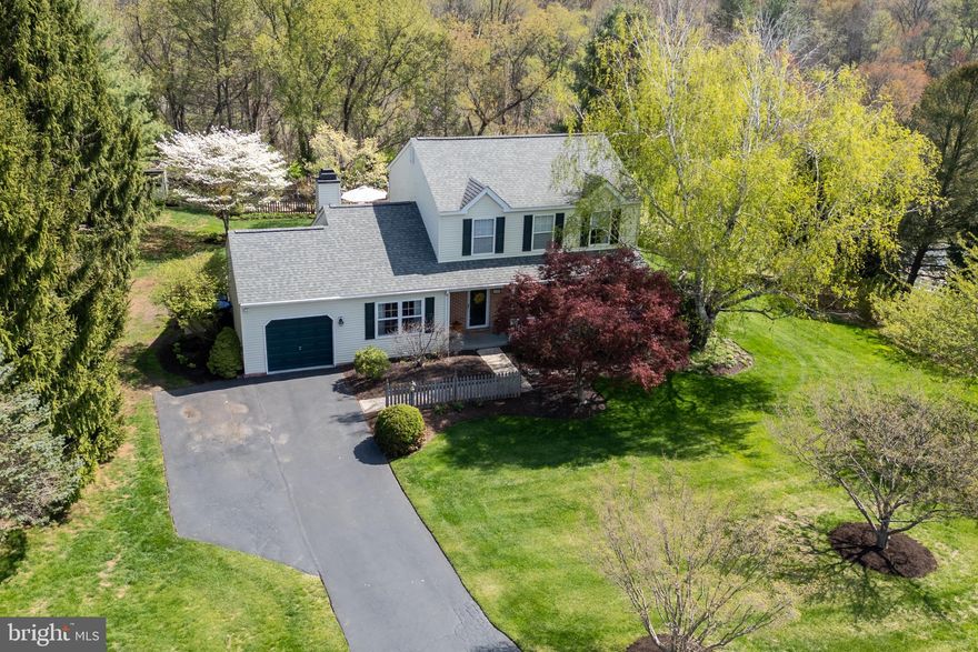 What an absolutely stunning property! 420 Trotters Way is a classic Colonial-style home situated on a ¾-acre lot with a beautifully manicured front yard and amazing outdoor living spaces. The pool with wrap around deck, a brick patio, and a fenced zen garden with an arbor will each give you plenty of choices for a favorite space to relax or entertain. A very private space, the yard will quickly become your own personal oasis, surrounded by evergreens, shade trees, and spring blooms. Inside, this home is bright and spacious with a classic center-hall floorplan that boasts formal living and dining, a 1st floor powder room, and a family room with a wood burning fireplace set just off the kitchen. Plus, there is a convenient 1st floor laundry room with a utility sink, and it exits directly outside to the patio. 420 Trotters Way also offers distinctive touches which include crown molding, chair rail, wainscotting, and hardwood floors. Upstairs, there are 3 bedrooms and 2 full bathrooms, including the owner’s retreat with an en suite bathroom. Plus, there is an unfinished basement that offers excellent storage. Tucked on a circular drive off S Bailey Rd, 420 Trotters Way enjoys a quiet, peaceful setting with very little through traffic, while still enjoying convenient access to West Chester Rd and BUS Rte 30. Request a personal tour today!