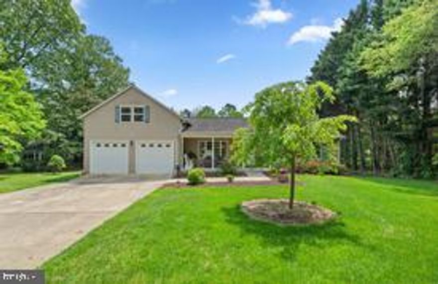 Welcome to 13891 Triadelphia Mill Rd, a beautiful and spacious home located in the charming town of Dayton, MD. This phenomenal home has been meticulously updated by the caring homeowner and you can see the pride of ownership throughout. You will be impressed by the amazing curb appeal of this home as you approach it. There is an extra wide driveway with space for multiple cars. Enter into a light-filled main level with a living room with views of gardens. There is an updated kitchen with ample cabinets, as well as space for a table. It opens to a dining/sunroom overlooking the lush green backyard. The main level hosts three bedrooms and two full baths. The primary bedroom has an attached primary bath. A deck off the dining room completes this level. The upper level has a large recreation space with a soaring ceiling, there is attic storage as well as a potential bedroom. The walk-out lower level has a full bath, laundry, and utilities, and opens to the patio and backyard. The garage has tons of storage space and opens to the backyard with a lovely area perfect for BBQs.  This property is just a short drive away from Warfield's pond park, Howard County Fairgrounds, Triapelphia Lake recreation area, Roots Market as well as Mall in Columbia.  For commuters, this property is ideally situated near several major highways, including I-70 and MD-32. You'll also be just a short drive from the Dorsey MARC station, providing easy access to Washington, D.C., and Baltimore.