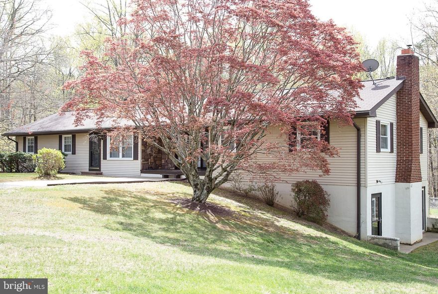 ** CHARMING ** Open Floor Plan w/MBR Suite with nwr engineered wood flrs. Quiet, serene 1.75 acre lot! Spacious Kitchen w/ample counter space. Large Bedrooms w/lots of storage & ceiling fans. Gorgeous natural light with windows galore. Rec room & VERY spacious basement. Backyard fully fenced with a separate shed & a large deck perfect for entertaining! NO HOA & less than 10 minutes from Quantico.