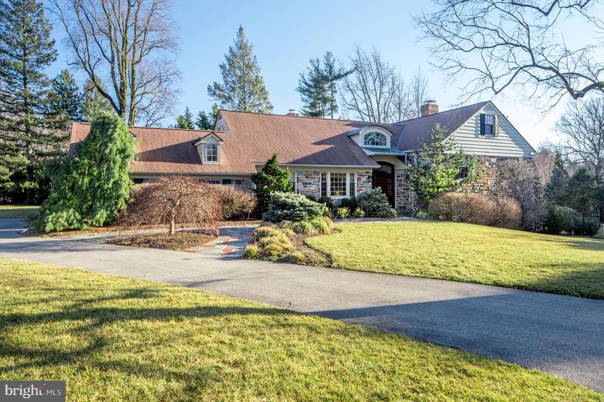 Welcome to 311 Rosemary Lane, a beautifully designed, lovingly maintained and updated, move-in condition home that offers today s family the comforts and conveniences they desire. Whether you re entertaining family, friends or your children s besties, inside or outdoors, there s plenty of room for everyone on every occasion, from holiday celebrations and Super Bowls to barbecues on the patio and pool parties! The location is just as appealing, on a great street with friendly neighbors, in a safe environment for the kids to play. Welsh Valley Middle School, with its tennis courts, fields and track, is right across the street, and local amenities and shopping are just minutes away. What could be better! From the moment you enter the lovely, light-filled, double-height foyer, you ll know you ve found the  one.  The gracious living space has a wonderful flow, with generously-proportioned main rooms for together time as well as intimate solo spaces. Hardwood floors, open archways and crown moldings are among the tasteful details. Take your pick of perfect spots for entertaining, in the large front-facing step-down living room with fireplace, or the formal dining room with views of the front grounds. The amazing kitchen/breakfast room/family room area is very expansive and ready to accommodate a crowd. Thanks to the open layout, the cook can seamlessly interact with the family while they re watching TV, reading the newspaper, or doing laundry nearby. Granite countertops, 2 huge islands, tons of cabinet storage, and Miele & Thermador stainless steel appliances and cooktop make the kitchen a dream. Open and adjacent is the incredible vaulted family room with wood-beamed ceilings, a projector with 100 inch drop-down screen, a stone fireplace and wet bar. This level also features a formal powder room, office/bedroom suite with built-ins and a full tiled bath with steam shower, second half bath, and mudroom connecting to the attached 2-car garage. Ascend a half level where the master and secondary suites await. The master bedroom experience is completed by a walk-in closet and spa-style bath with double sinks, soaking tub and oversized shower. Another 2 bedrooms, one with lovely built-ins, and a full hall bath occupy an additional half level up. Storage space abounds throughout the home. The carpeted lower level with a fireside rec room, tiled gym area, quiet workstation and half bath is a haven for one and all that opens to the wonderful pool and spacious fenced yard. Come see this gem for yourself!