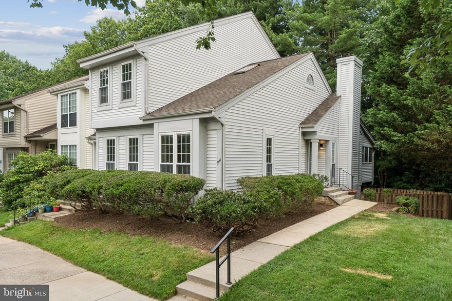 Beautifully Renovated End-Unit Townhome! This spacious 3 bed, 3.5 bath home features a dramatic two-story foyer and a contemporary open layout. Enjoy new flooring throughout, a fully updated kitchen, and renovated bathrooms. The main-level primary suite offers comfort and convenience. A separate dining room is perfect for formal meals or entertaining, while the expansive living room boasts a cozy wood-burning fireplace. Step out to the screened-in porch for peaceful outdoor living. The fully finished walk-out basement includes a full bath—ideal for guests, a rec room, or home office. Freshly painted with a new roof and just minutes to the Metro and public transit. Move-in ready with style and space!