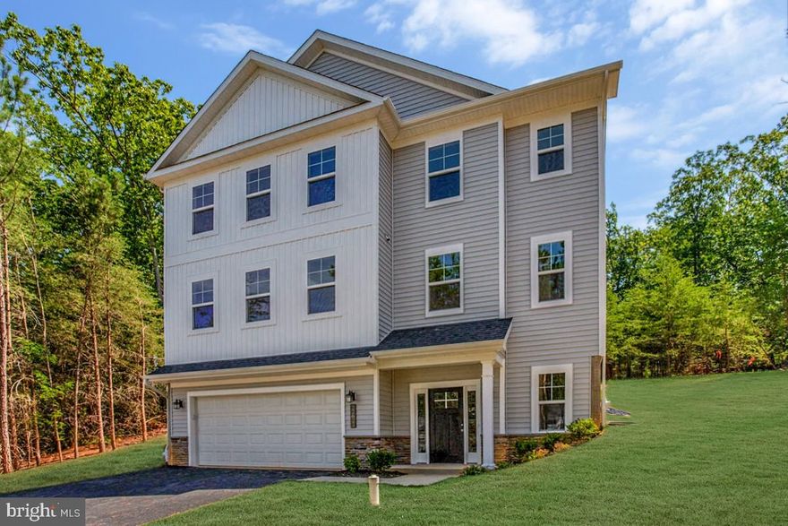 THIS IS A TO BE BUILT HOME.    Act soon while you are able to still personalize this home with interior selections!
Enjoy water views of the community harbor with 60 boat slips and direct access to the Chesapeake Bay—a dream setting for boating and coastal living. This beautifully crafted home features classic board-and-batten siding and a welcoming front porch that creates timeless curb appeal.

Inside, the open-concept layout seamlessly connects the dining area and family room, making it perfect for everyday living and entertaining. The spacious kitchen is the heart of the home, showcasing an oversized quartz island, stainless steel appliances, and abundant cabinetry for both casual meals and gatherings. A main-level home office or flexible choice room offers the ideal space for working from home or relaxing. 

Upstairs, the owner’s suite features a large picture window, expansive walk-in closet, and a spa-inspired bath with a luxury shower.

Just a short walk to the community center and playground, residents also enjoy Cedarhurst’s rare four acres of community-owned waterfront property with panoramic bay views, open lawns, wetlands, picnic areas, playgrounds, ball fields, and opportunities to watch sunrises, sailboats, waterfowl, and local watermen working the bay.