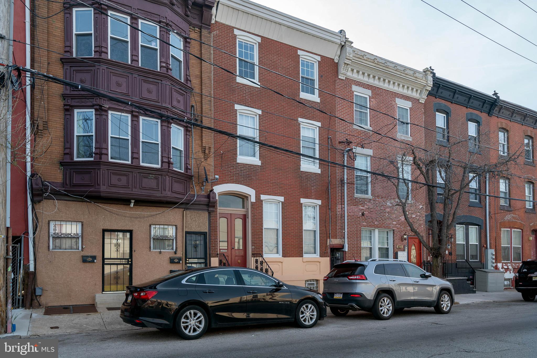 Welcome to 929 N. 6th Street! An AMAZING investment opportunity in the well sought after Northern Liberties section of Philadelphia! This well maintained and appointed triplex is the perfect multifamily property for an owner-occupant investor or an investor only looking for cash flow. This spacious 3,168 SF triplex features a 1 bedroom/1 bath first floor unit , a 1 bedroom/1.5 bath second floor fully furnished Airbnb and a 2 bedroom/1 bath unit on the third floor with all units having utilities separately metered..
Constructed with years past craftmanship in 1920, the front entrance door and moldings, foyer with custom millwork and marble, common areas with custom stairs, stair railings and spindles, original wood floors, brick facade and marble fireplace surrounds are just a few of the construction practices that give this home its old world charm.
The rents currently are: the 1st floor is $1,750/month on a month to month term, the 2nd floor medium term (30+ days ) Airbnb averages $2,400/month and the 3rd floor is $2,300/month on a month to month term. Fully occupied with flexible leases, monthly rents will be able to be increased.
The first floor is a 1 bedroom/1 bath plus office that has a very large private outdoor patio along with alley access. The family room is complimented with 12 foot soaring ceilings and custom millwork along with custom marble fireplace surround, The kitchen features wood cabinetry, tile backsplash, stainless steel appliances and porcelain tile floor The bathroom has porcelain floors and subway tile shower walls. Laminate floors throughout.
The second floor unit is a 1 bedroom/1.5 baths and is currently leased as an Airbnb with an average monthly income of $2,400. This Airbnb is a stylish, fully furnished, turn- key, medium term (30+ days) rental with Super Host designation and great reviews. It was refinished/upgraded in 2022 for Airbnb use. Some of the highlights are wood cabinets in the kitchen/baths, tile backsplash in kitchen, porcelain tile floor in kitchen, stainless steel appliances, kitchen island, custom marble fireplace surround, stack washer/dryer, laminate floors, exposed brick wall in bedroom, ceramic tile walls and floor in full bathroom, deck with Trex construction.
The top floor is a recently (2019) renovated 2 bedroom/1 bath unit with a large, open formal family room and kitchen with views of center city. Exposed brick walls in both the family room and one bedroom. Other amenities include original wood floors, wood cabinnets in kitchen and bathroom, stainless steel appliances, porcelain tile floorand shower walls in bathroom. porcelain tile floor in kitchen. laminate floors in bedrooms. Closet with washer and dryer. Capable of adding a roof deck.
Lastly, the basement is unfinished. The seller engaged a registered architect to complete construction documents to finish the basement by adding 2 bedrooms, full bathroom and a lounge area. The first floor unit can then be leased as a 3 bedroom/2 bath unit. This will increase the monthly rent substantially. Construction documents would be turned over to the new owner.
As far as Fire and Security, the triplex is equipped with a full scale fire alarm system serviced annually by Kartman Fire Protection, 2 Google Nest security camers (one on the front exterior and one in the interrior first floor common area) and Schlage Digital Key Pad Locksets on all entry doors..
Conveniently located close to public transportation, major highways, within walking distance to all the shops, restaurants, and entertainment that Northern Liberties and Fishtown have to offer. The City School is directly across the street. New Amazon grocery store within walking distance of this 6th and Spring Garden location will open soon. Recent new development continues throughout Northern Liberties adding value to an already vibrant area of the city
.