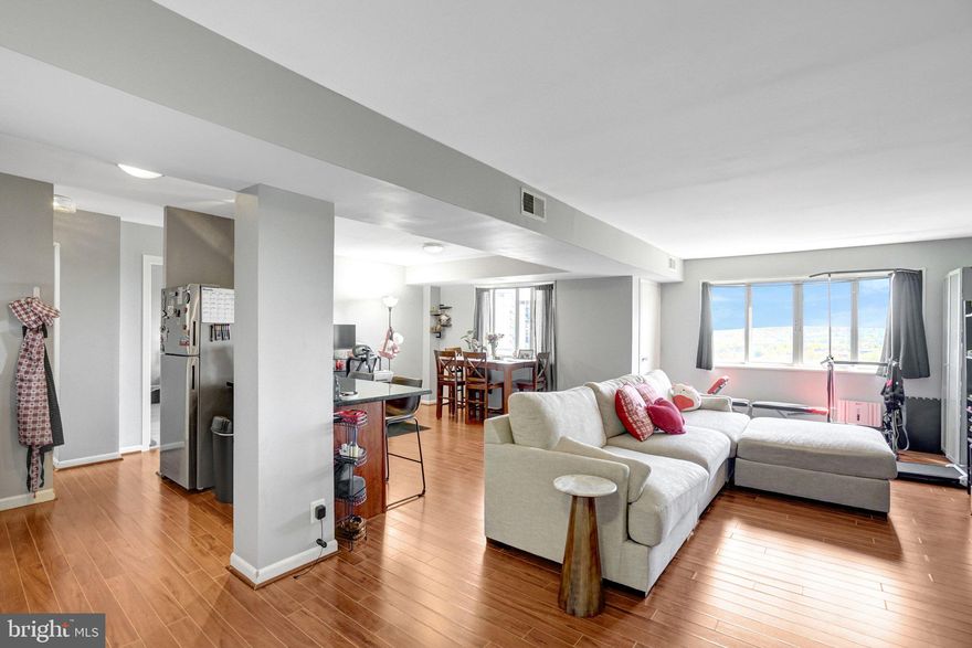 ALL UTILITIES INCLUDED! Experience effortless living in this sun-soaked 1-bedroom, 1-bathroom condo at Pavilion on the Park. This move-in-ready unit features an in-unit washer and dryer and a private balcony, ideal for morning coffee or evening relaxation.

Enjoy a bright, open floor plan with oversized windows. The versatile living-dining area easily adapts to personal style. The kitchen features granite countertops, a breakfast bar, and an updated stainless-steel stove and refrigerator. The spacious bedroom and walk-in closet have been refreshed with premium luxury laminate flooring. 

The all-inclusive condo fee covers all utilities, garbage disposal, and building maintenance, allowing for a predictable monthly budget. Residents enjoy a premium amenity package that includes an outdoor pool, fitness center, sauna, grilling area, and party room. Outdoor enthusiasts benefit from direct access to the scenic Holmes Run Trail and bike storage. The location is just minutes from Old Town Alexandria and only two miles from the Van Dorn Metro, making it a commuter's dream. Bus stops are steps from the front door, and I-395/495 is easily accessible, making quick trips to DC, the Pentagon, or Arlington easy. Residents enjoy unassigned, open parking and a concierge service desk—welcome home!