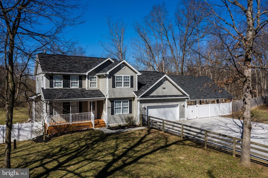 When you talk about the features that this property has, the list goes on and on.  A generously sized 3 bedroom colonial on 3.5 acres of fully fenced property which has tremendous potential for the indoor/outdoor lifestyle of your dreams.  A fully private party patio with ceramic flooring, exposed vaulted ceilings, and motorized shades adjoins the house for the perfect getaway, while the screened deck at the rear of the property is ideal for outdoor dining and relaxation.  This is all privately tucked into a partially wooded section of the property which is fully fenced so the animals can roam freely.  The good times don't quit even if the power does, with a 48KW standby generator and two (2) 1000 gallon propane tanks.  The interior features a master bedroom suite, hardwood flooring, a propane fireplace, and a traditional layout with chair rail and crown molding accents in the family and dining rooms.  All of the carpet in the property has been recently replaced., with kitchen updates including refinished cabinetry, granite countertops and new SS refrigerator.