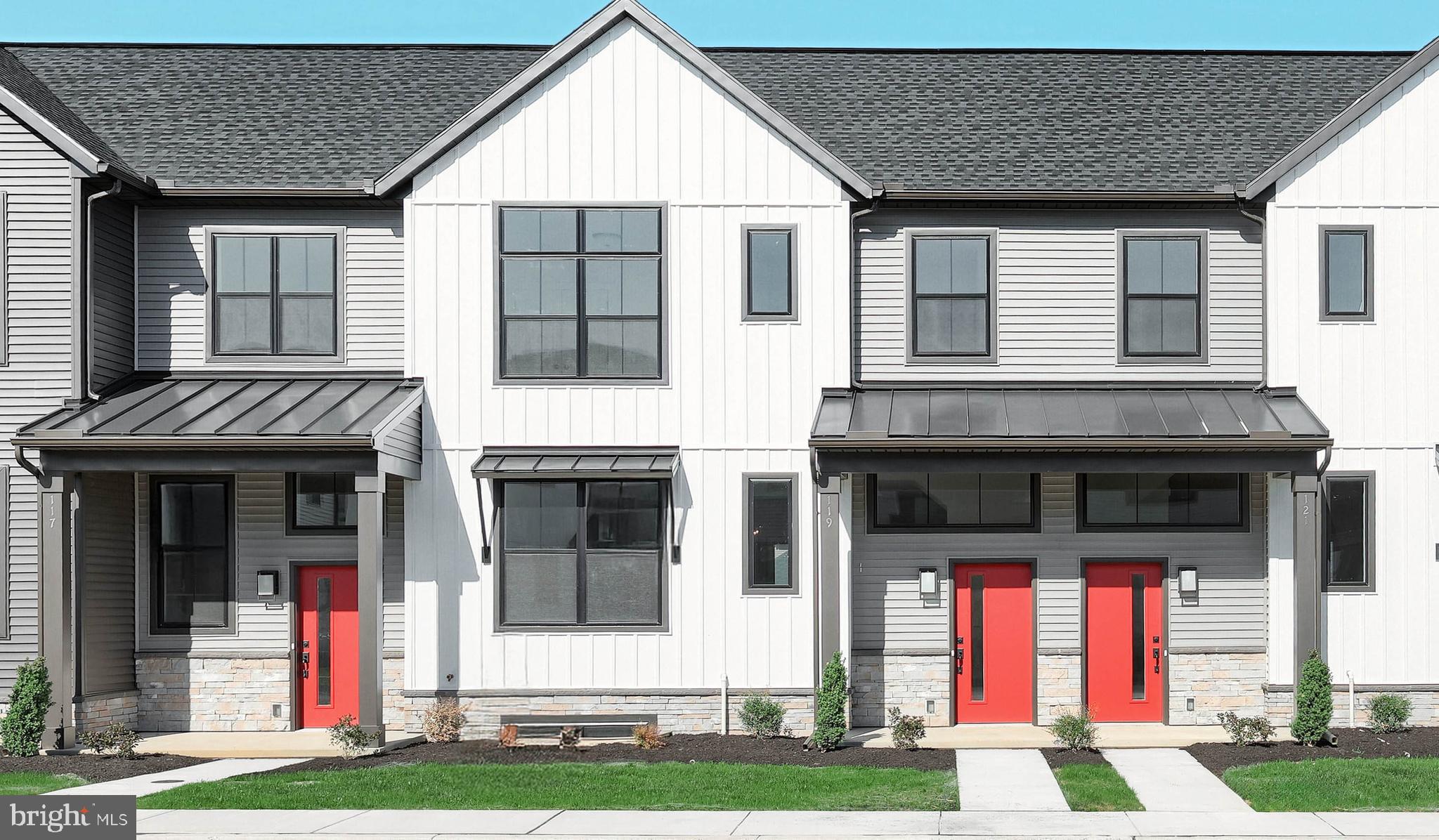 This 2-story townhome includes a 1-car, rear load garage, mudroom entry, and a patio for outdoor living. The first floor boasts 9’ ceilings and stylish vinyl plank flooring. The kitchen is well-equipped with stainless steel appliances, attractive cabinetry, and quartz countertops with a tile backsplash. The kitchen opens to a spacious dining area with a tray ceiling and a sunny living room. All 3 bedrooms, 2 full bathrooms, and a convenient laundry room adorn the second floor. The owner’s suite features an expansive closet, and a private bathroom with a double bowl vanity and 5’ shower.