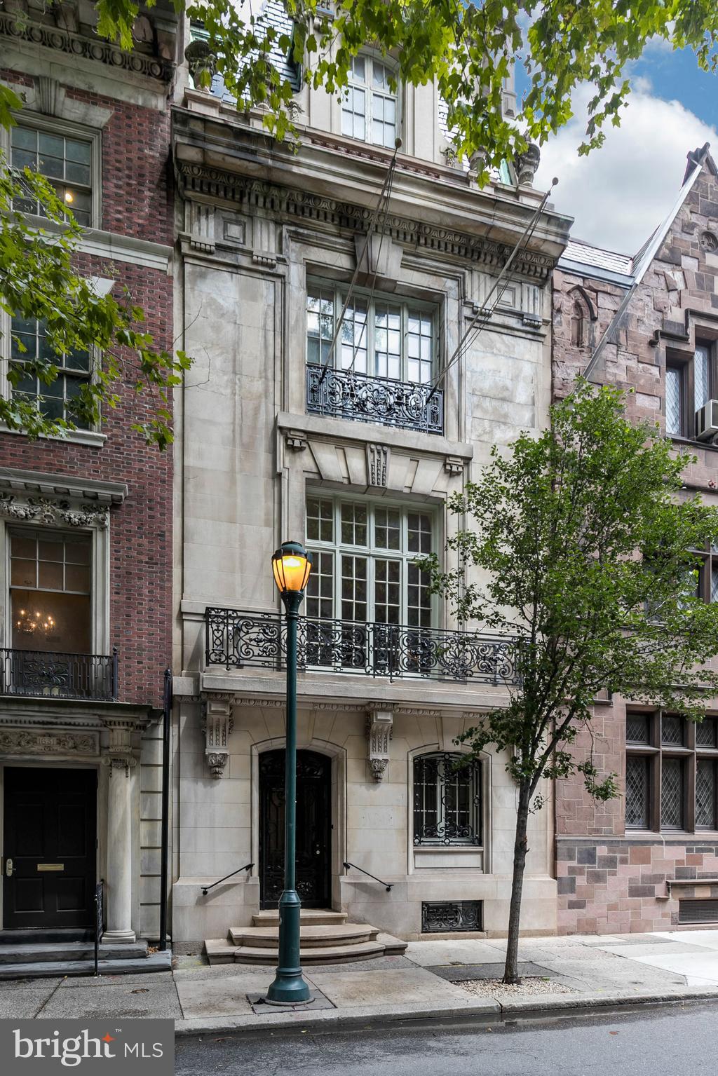 Welcome to 1629 Locust Street, a once-in-a-generation opportunity to acquire an architectural masterpiece by Horace Trumbauer. Built in 1902, Mr. Trumbauer masterfully designed this five-story townhouse for a sugar baron Edward C. Knight. This property is one of the few remaining contributions of Mr. Trumbauer to the architectural history of Philadelphia. In the exterior façade, Mr. Trumbauer incorporated bold design elements of 18th Century French architecture, such as wrought iron gates created by Samuel Yellin on the front door, windows and balconies. The interior of the Knight Residence is truly exquisite with the most prominent design feature being the elliptical Carrara marble staircase with an elegant iron railing that rises four stories to an oeil-de-boeuf skylight. The second floor is comprised of two Louis XV style salon rooms, which currently serve as meeting rooms. These rooms feature elaborate bronze mounts with arched windows and molded plaster rondels. The third and fourth floors are also elegantly designed in Louis XVI style. The fifth floor, which previously served as the butler's room, is connected to the fourth floor by an interior spiral wooden staircase. With generous CMX-3 zoning, this property provides a blank canvas for occupancy and redevelopment by either an investor or occupant. The location on beautiful tree-lined Locust Street is reminiscent of the opulence and elegance of old-world Philadelphia.