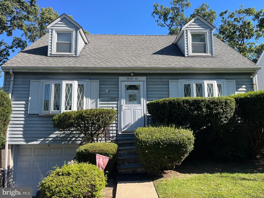 Anneslie, 4 bedroom 2.5 bath cape cod. Wood grain, vinyl laminate floors through out. Summer kitchen in lower level for those hot summer canning jobs or for the extra baking space for the holidays. Updated roof, HVAC, some windows and entry doors. 1 car garage and off street parking for 3 cars. Full bath on upper level and 2 bedrooms. Full bath on the main level and 2 bedrooms, living room with fireplace, family rooms, kitchen and dining rooms. Lower level garage, powder room, club room, utility room and kitchen. Great space for entertaining. Level back yard backs to trees. This is the kind of neighborhood from days gone by.