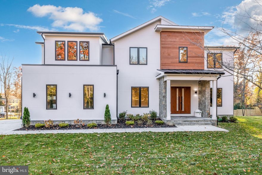 *** I  AM GORGEOUS! NEW CONSTRUCTION  BY  BELLA HOME!  JUST COMPLETED! 
 OPEN HOUSE SUNDAY,  12/17 FROM 1 TO  3 PM ***
One of a kind luxury living in this spectacular sleek modern design by Bella Home Construction. This home features close to 8,000 square feet of finished living  area with 6 bedrooms, 6 full bathrooms and 2 half baths. Lot is over half an acre in the Woodson High School Pyramid.  This gorgeous home has been meticulously built with superb quality and exquisite finishes.  10 ft ceilings on the main level and 9 ft ceilings  on the upper and lower levels. 7 1/2” European oak floors throughout all 3 levels. Beautiful wood accent walls throughout the home.  On the main level,  you'll be welcomed by a grand foyer, formal living room and a full-sized dining room, a gourmet kitchen, a family room complete with a gas fireplace, an
 office  and a large main level bedroom guest suite. The impressive kitchen is adorned with a massive 10 ft island with quartz countertops and stainless steel appliances, a built in pantry room and a butler’s pantry. Huge yard for a potential pool. On the upper level, you'll discover 4 bedrooms with its own private luxurious bathrooms. The grand owner suite has a exquisite spa-like bath with heated floors, a spectacular 2-person rain shower, a free standing oversized 72” soaking tub, and a 2 huge walk-in closet with custom cabinetry.  Upper level laundry room with washer and  dryer. The lower level features a custom expanded family/recreation room with a gas fireplace,  theater, wet bar and wine cooler, exercise room, bedroom, full bathroom and half bathroom. The oversized two car garage comes with two electrical car chargers for your convenience.   Dual zone HVAC units are installed for comfort living. Do not miss out on this opportunity! Conveniently located to Beltway- I-495,  395,  Old Town, Amazon HQ2 and metro .