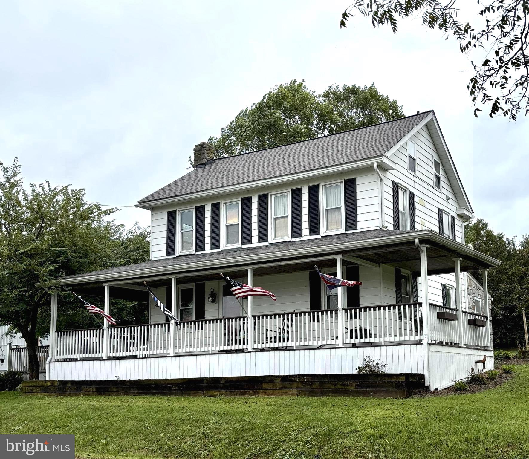 HERE IT IS! A perfect, cozy farmhouse with an oversized front porch and side deck to come home and relax too!!! The 1st floor features a large, eat in country kitchen, living room, a separate large room, and still more in the back of the home. The laundry and one full bath are also on the 1st floor with easy access to the outside keeping dirt from trekking throughout the house. Love the convenience! 2 or 3 Bedrooms on the 2nd floor and the attic is finished off for another bedroom. A full and a half bath are also there. Efficiency is a huge plus with all the repairs, replacements, and sensible things the Seller has recently done bringing you a lot of comfort in knowing the hard part is done. (See docs for information on changes)
Sitting on 3.5 acres and zoned Rural Residential can add versatility to your plans for your piece of heaven. The detached “Man Cave” with a large tool room and the separate large Pole Building can keep all you need for creating your own paradise. Plenty of space for your ideas and more. Fenced pastures are ready to help you to welcome an animal family.