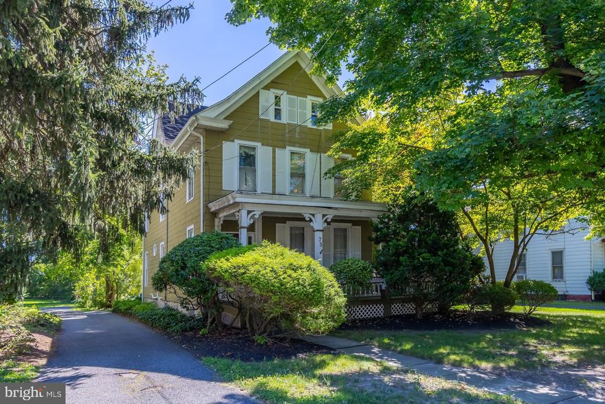 Step back in time while enjoying modern comforts in this 1905 Historic Victorian, proudly set on the historic main drag of a quaint, storybook town. From the moment you arrive, the wrap-around porch and side screened-in porch invite you to slow down and savor the charm of a bygone era.

Inside, a gracious entry foyer showcases original woodwork, stunning architectural details, and arched bay windows that flood the home with natural light. 10-foot ceilings, a back staircase, and white pine random-width hardwood floors with a tung oil finish highlight the home’s authentic craftsmanship. The formal living and dining rooms are perfect for entertaining or cozy gatherings.

The kitchen blends charm and function with modern updates, including granite countertops, stainless steel appliances, tile backsplash, and a bright breakfast nook overlooking the yard. A first-floor bath with a classic clawfoot tub, along with a large laundry/mudroom, adds everyday convenience.

Upstairs, the spacious primary bedroom connects to an adjacent bedroom currently used as a den—ideal for a private sitting room, nursery, or dressing area. A nicely updated second-floor bath and an additional office/den provide flexible living space.

The third floor offers abundant additional space, perfect for a studio, guest quarters, playroom, or future expansion—providing endless possibilities to suit your needs.

Outside, enjoy a large yard and a two-car detached garage, offering both privacy and practicality. This rare offering seamlessly combines historic character, thoughtful updates, and an unbeatable location—a true gem in the heart of town.   Walk to shoppes, bakery, cafes, dining and ice-cream parlor!  You can enjoy many Main street events right from your charming front porch!  Serviced by Clearview School district. Come and experience Mullica Hill living.