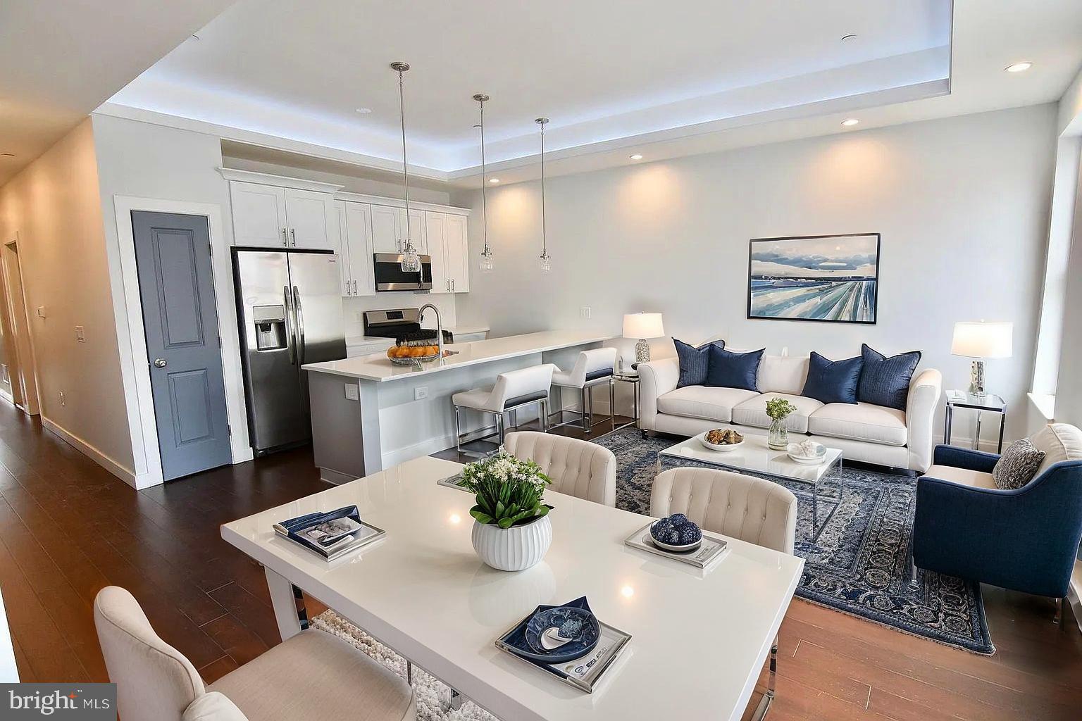 Modern elegance and strong investment potential come together in this stunning 2019-built triplex located in the heart of Philadelphia’s thriving Ludlow neighborhood. Spanning approximately 3,970 square feet, this multi-family property features three thoughtfully designed units with a total of 7 bedrooms and 7 bathrooms. Unit 1 is a spacious 3-bedroom, 3-bath bi-level apartment with a finished basement, private patio access from the lower level, and a private backyard—ideal for tenants seeking extra space and outdoor access. Unit 2 offers 2 bedrooms and 2 bathrooms across 1,200 square feet, while Unit 3 includes 2 bedrooms and 2 bathrooms within 1,070 square feet and exclusive access to a large roof deck with sweeping views of the city skyline.
Each apartment boasts high-end finishes including rich dark hardwood flooring, quartz countertops, double-sink vanities, and LED accent lighting running across the ceilings for added ambiance. The open-concept living rooms are flooded with natural light and provide ample space for entertaining or relaxing. All units are equipped with in-unit laundry, central air conditioning, gas heating, and modern fixtures throughout. The building also features a security camera system and intercom entry for added peace of mind. The exterior is finished in timeless brick, and the lot size is approximately 1,759 square feet. With on-street parking, a desirable location near Fishtown, Northern Liberties, and Temple University, and strong rental appeal, this turn-key triplex is a rare opportunity for an owner-occupant or investor looking to secure a high-quality asset in one of Philadelphia’s fastest-growing neighborhoods.