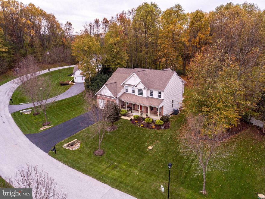 MUST SEE! Located in the coveted neighborhood of Coxby Estates III. Sun-filled rooms; 2 story great room; eat-in kitchen; MBR with ensuite bath; walk-in closet; 2 car garage. Additional 1,800 sqft finished walk-out basement with full bath and 2 rooms - perfect retreat for guests. Total of 6,204 sqft. Private, peaceful 1 acre lot; spa; spacious deck in tranquil wooded haven! Check out Virt tour!