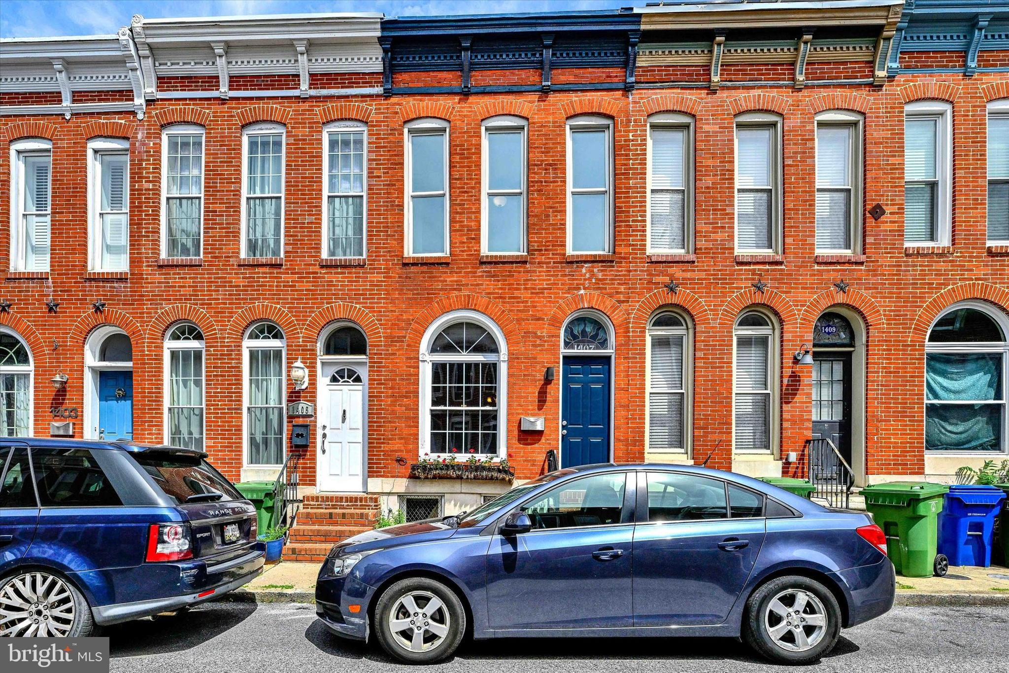 Charming Home in the Heart of Federal Hill!
Welcome to 1407 Clarkson St—this delightful 2 bedroom, 2 bathroom home is situated in the vibrant heart of Federal Hill. Offering classic charm, the property showcases exposed brick, hardwood floors, and tin ceilings, creating a warm and inviting atmosphere. The main level features a living room, dining room, kitchen, full bathroom, and access to a large back patio, which offers ample space for entertaining or parking 2 cars. Upstairs, the front bedroom is generously sized and benefits from abundant sunshine through 3 large windows. There is also a walk-through space that is ideal for an office or extra living area. Towards the back of the house is a second well-sized bedroom and another full bathroom. The basement provides an unfinished storage space, a finished recreation room, and a laundry area. You won’t have to search for parking because the property includes 2 tandem parking spots. Schedule a tour and discover the charm and convenience of 1407 Clarkson St. This home is a perfect blend of historic charm and modern amenities, ready to become your new residence in Federal Hill.