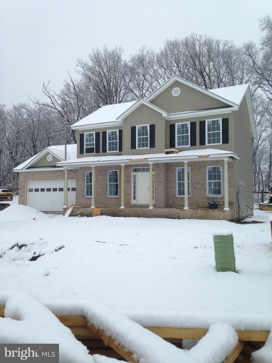 This brand new home is situated in a well kept and desirable subdivision. It is one of few homes built on a lot that backs up to wooded/vacant ground for extra privacy. All hardwood floors and 9 foot ceilings on first floor. Call today to see this well built home!