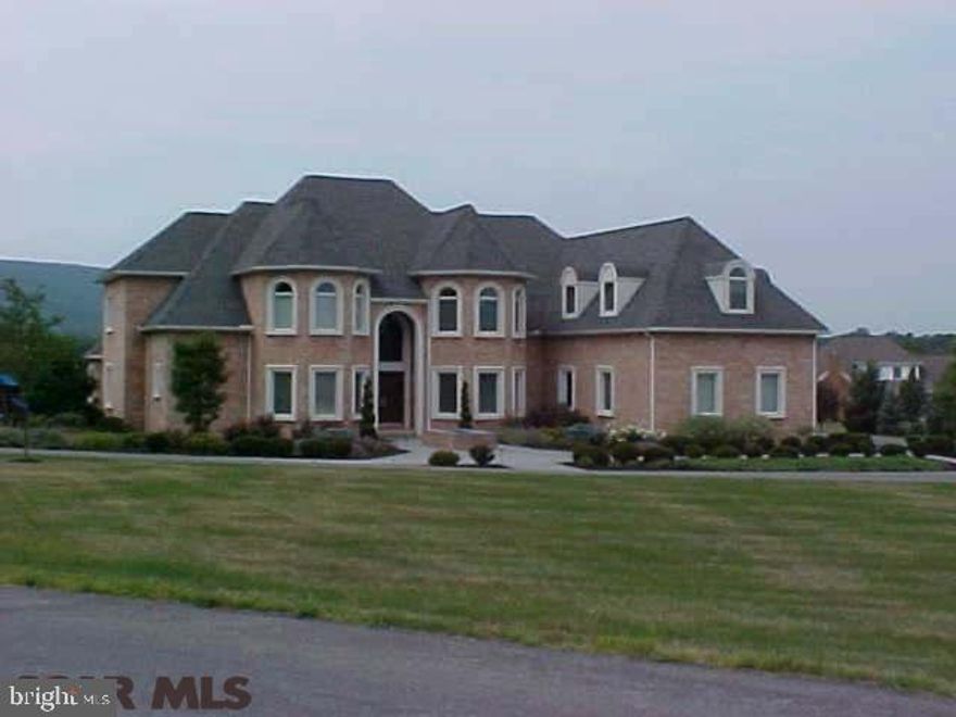 For Comparable Purpose Only. This amazing home has a brand new state of the art kitchen; 5-6 bedrooms plus office. First floor guest suite w/full bathroom. Huge bonus room w/playroom. Beautifully finished lower level w/gym, theater area, full bathroom, wet bar and bedroom! Soaring ceilings, new flooring, freshly painted with modern tones. Elevator, 3 car garage, walk in pantry.