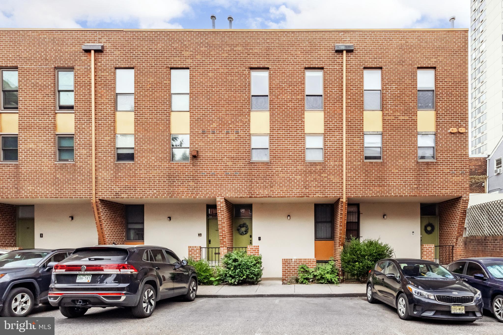 Welcome home to 1926 Nectarine Street! This spacious, move-in ready upper bi-level in the highly sought after Hamilton Townhomes community offers great indoor and outdoor living space in one of the most walkable neighborhoods Philly has to offer. As you enter this wonderful home up the steps you are welcomed into a bright open concept living and dining space with new hardwood floors throughout. From the living room, step out onto the large, private balcony with center city views and access to your private storage closet. Back inside, the efficient kitchen, powder room, coat closet, and laundry closet round out the first floor. Upstairs the large primary bedroom features vaulted ceilings, plentiful closet space, and ensuite bathroom. Two additional bedrooms share the well appointed hall bathroom with storage and a bathtub. This property has been well maintained and includes a newer hot water heater, central A/C unit, and washer and dryer.  Parking will never be a concern as this home comes with its own assigned parking space directly in front of the unit. If you choose to forego your car, you can easily walk to Target, Whole Foods, the Rodin Museum, and the many delicious restaurants that Fairmount has to offer. Schedule your showing now, as this fantastic home is sure to sell quickly!