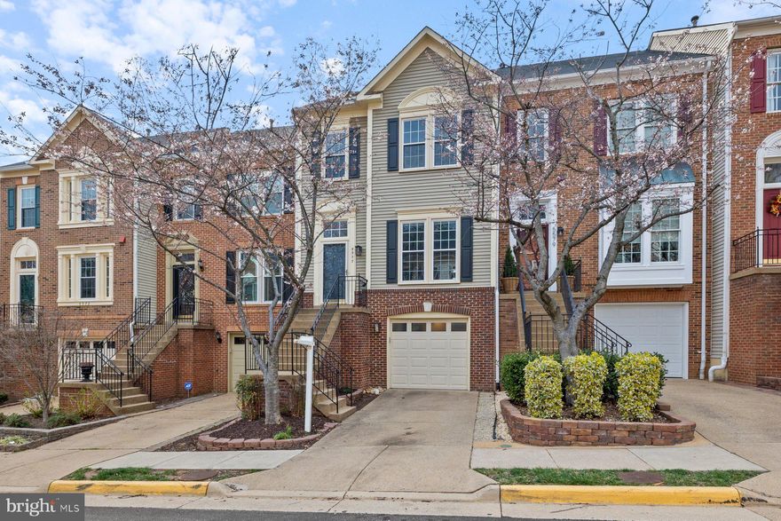 Welcome to this gorgeous three-level townhouse nestled on a serene street in Kingstowne! This home has 3 bedrooms, 2 full bathrooms and 2 half bathrooms and is 2000 sq ft with a one-car garage. Move in ready!
This home is spacious, bright, and beautifully refreshed with brand-new carpet and fresh paint from top to bottom. This home features a desirable bump-out, offering additional square footage on all three levels—a rare enhancement not found in all floor plans, and one that makes a significant difference in both space and functionality. Step into the beautifully designed main level of this home, where an open concept layout creates a warm and inviting space perfect for everyday living and entertaining. Crown moulding throughout adds an elegant touch, while rich hardwood floors flow seamlessly from room to room.The foyer welcomes you with a spacious coat closet and a convenient powder room. The kitchen is a true standout, featuring recessed lighting, sleek stainless steel appliances, crisp white cabinets, and a large center island with seating—ideal for casual dining or gathering with guests. There’s also plenty of space for a sit-in dining table, making mealtimes feel cozy and connected. Just off the kitchen, step out onto a charming deck—perfect for morning coffee or evening relaxation. This main level truly blends style and functionality with comfort and charm.

The primary bedroom is a true retreat, featuring vaulted ceilings, a lighted ceiling fan, a generous walk-in closet, and a luxurious en suite bathroom with a separate soaking tub, stand-up shower, and a double-sink vanity. Two additional bedrooms share a well-appointed hall bathroom with a shower/tub combo. The extra high ceilings on this level create an elevated sense of space and comfort you’ll appreciate every day.

The lower level offers a versatile and inviting space with a tiled floor and a spacious open layout—perfect for a recreation room, home office, or play area. A cozy gas fireplace adds warmth and charm, while recessed lighting keeps the space bright and welcoming. You’ll also find a convenient powder room, a stackable washer and dryer with additional storage, and walk-out access to the backyard—ideal for indoor-outdoor living. This level also provides interior access to the one-car garage, which includes a separate storage room and a utility closet, giving you even more space to stay organized.

This home has been meticulously cared for with major updates, including HVAC (2018), roof (2014), windows (2013) with a transferable lifetime warranty, microwave (installed in 2024), and a garage door replacement in 2019. The exterior was freshly painted in 2021, and the entire home features brand new hardwood flooring, carpet, and interior paint ($20K). Bonus: all the paint swatches are available!

The home feeds to Lane Elementary School, Twain Middle School, and Edison High School.

Community amenities include a sparkling pool, tennis courts, tot lots, a serene lake, scenic jogging and walking paths, a fully equipped fitness center, bike trails, a clubhouse, basketball courts, as well as snow removal and trash services—all covered by the HOA.

This home is ideally situated with easy access to both the Franconia-Springfield and Van Dorn Metro stations, making your commute a breeze. You'll be just moments away from a plethora of shopping and dining options at Kingstowne Towne Center and Springfield Town Center. Located just outside the Beltway, the property provides quick and convenient access to major highways—I-95, I-395, and I-495—connecting you effortlessly to the greater Washington, D.C. area. Make your appointment today!