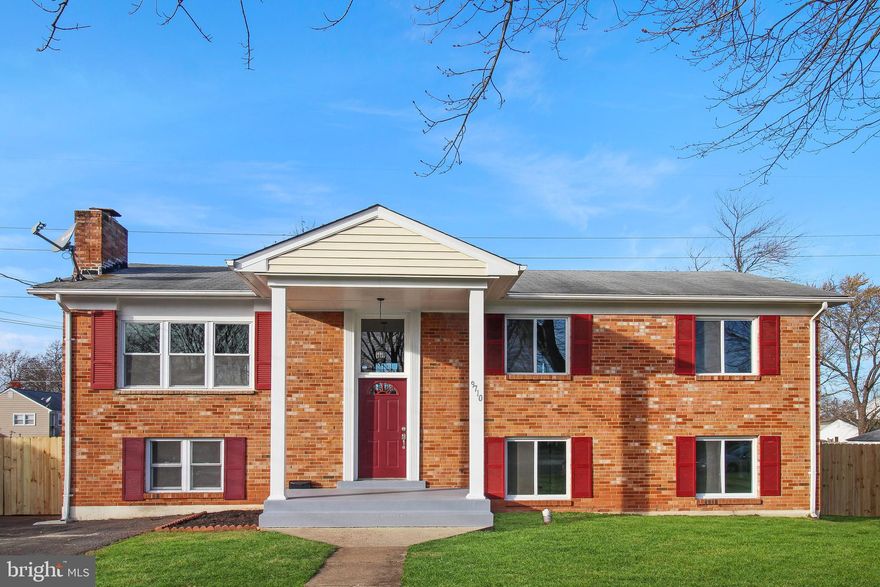 The home has been entirely repainted, the hardwood floors have been refinished and new carpet installed. Five bedrooms and three full baths give you tons of room. There is a dining room and formal living room on the upper level. The lover level have a carpeted den with a raised brick hearth fireplace, and a tiled bonus room that has a sliding glass door to the back patio. The upper level  deck overlooks a very large, fenced in back yard. Kitchenette, lower level bedrooms and full bath would be great for an in-law suite or rental income. Terrific location!! Close to shopping, dining, entertainment, and easy access to commuting routes.